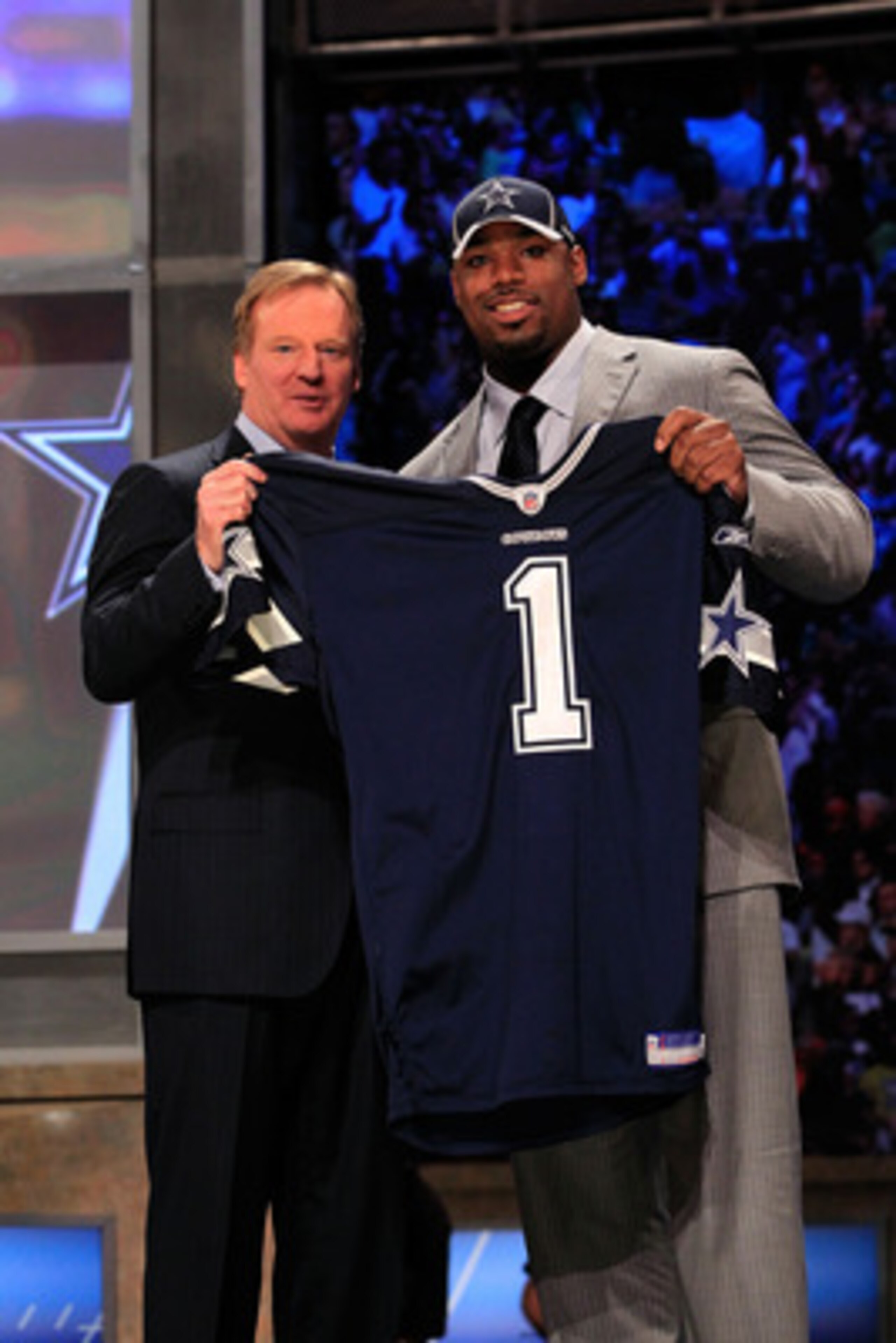 NEW YORK, NY - APRIL 28:  NFL Commissioner Roger Goodell (L) poses for a photo with Tyron Smith, #9 overall pick by the Dallas Cowboys, on stage during the 2011 NFL Draft at Radio City Music Hall on April 28, 2011 in New York City.  (Photo by Chris Trotma