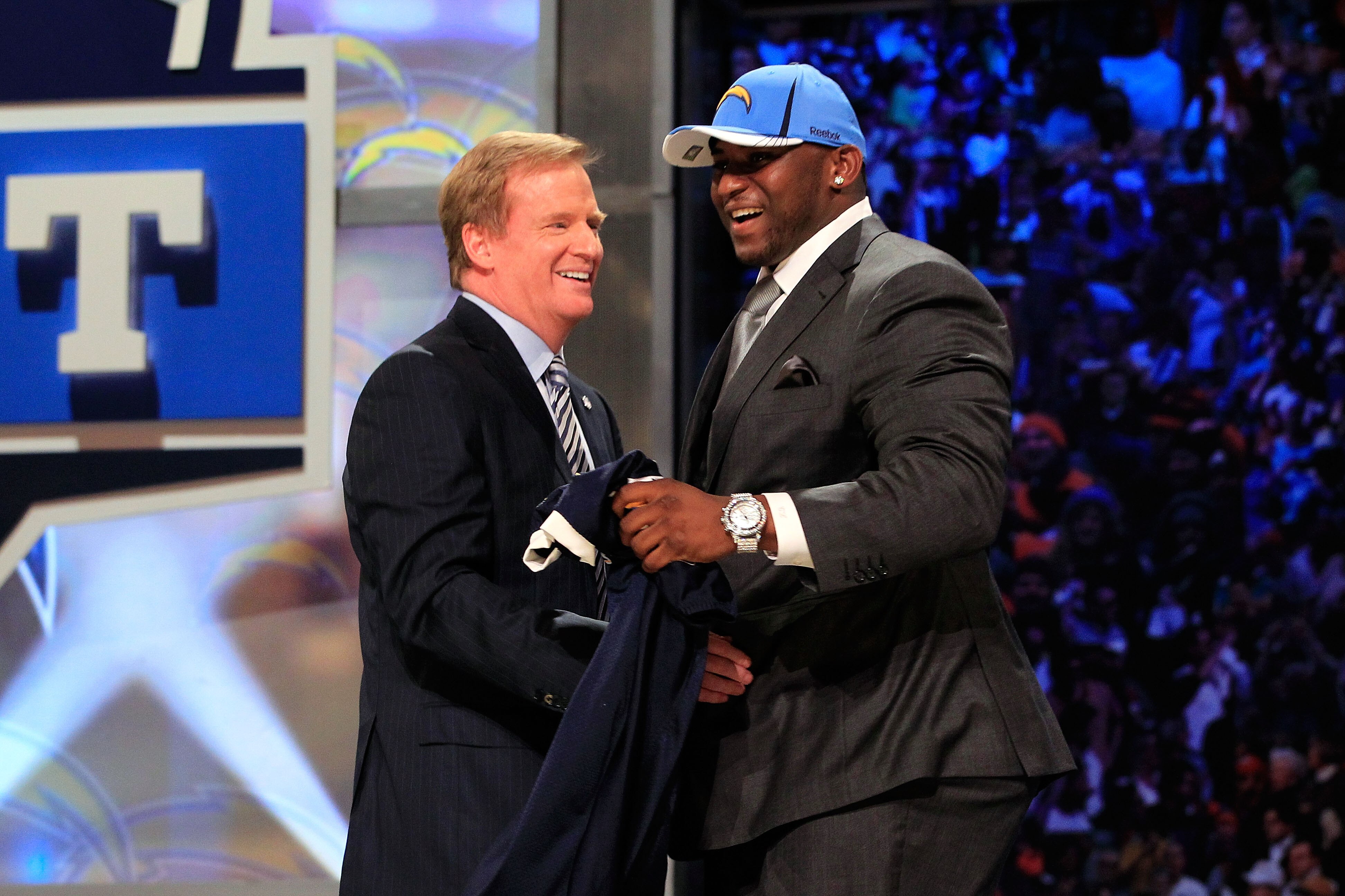 NEW YORK, NY - APRIL 28:  NFL Commissioner Roger Goodell (L) greets Corey Liuget, #18 overall pick by the San Diego Chargers, on stage during the 2011 NFL Draft at Radio City Music Hall on April 28, 2011 in New York City.  (Photo by Chris Trotman/Getty Im