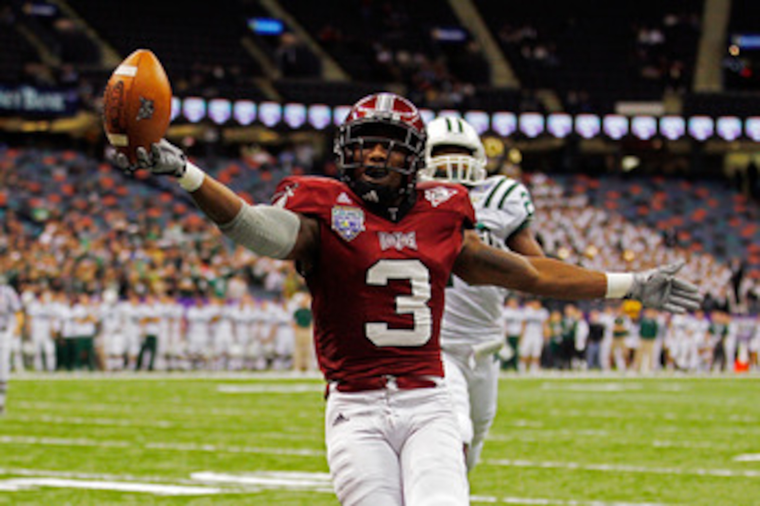 NEW ORLEANS, LA - DECEMBER 18: Jerrel Jernigan #3 of the Troy University Trojans scores a touchdown over Donovan Fletcher #29 of the Ohio University Bobcats during the R&L Carriers New Orleans Bowl at the Louisiana Superdome on December 18, 2010 in New O NEW ORLEANS, LA - DECEMBER 18: Jerrel Jernigan #3 of the Troy University Trojans scores a touchdown over Donovan Fletcher #29 of the Ohio University Bobcats during the R&L Carriers New Orleans Bowl at the Louisiana Superdome on December 18, 2010 in New O