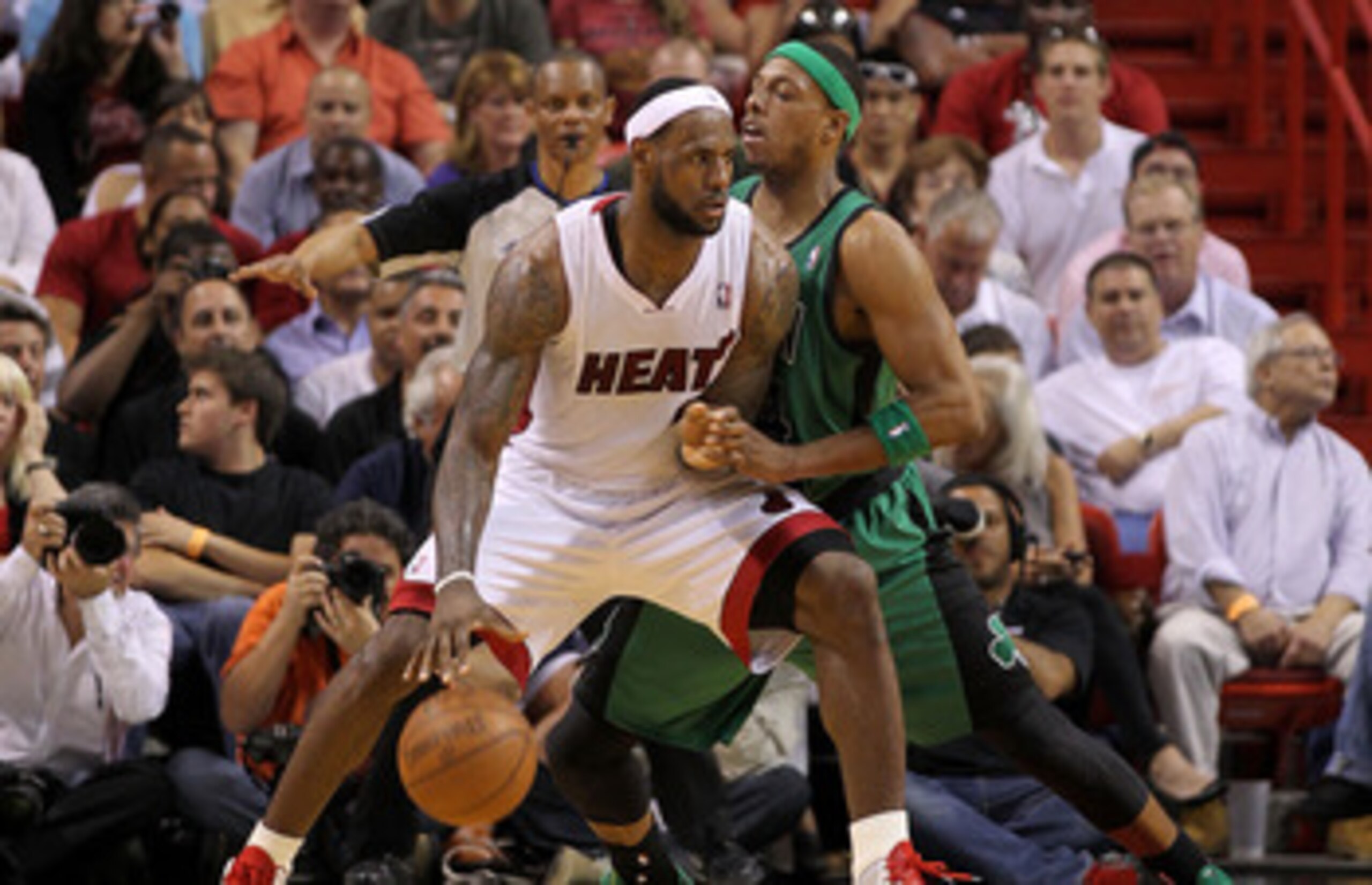 MIAMI, FL - APRIL 10:  LeBron James #6 of the Miami Heat posts up Paul Pierce #34 of the Boston Celtics during a game  at American Airlines Arena on April 10, 2011 in Miami, Florida. NOTE TO USER: User expressly acknowledges and agrees that, by downloadin