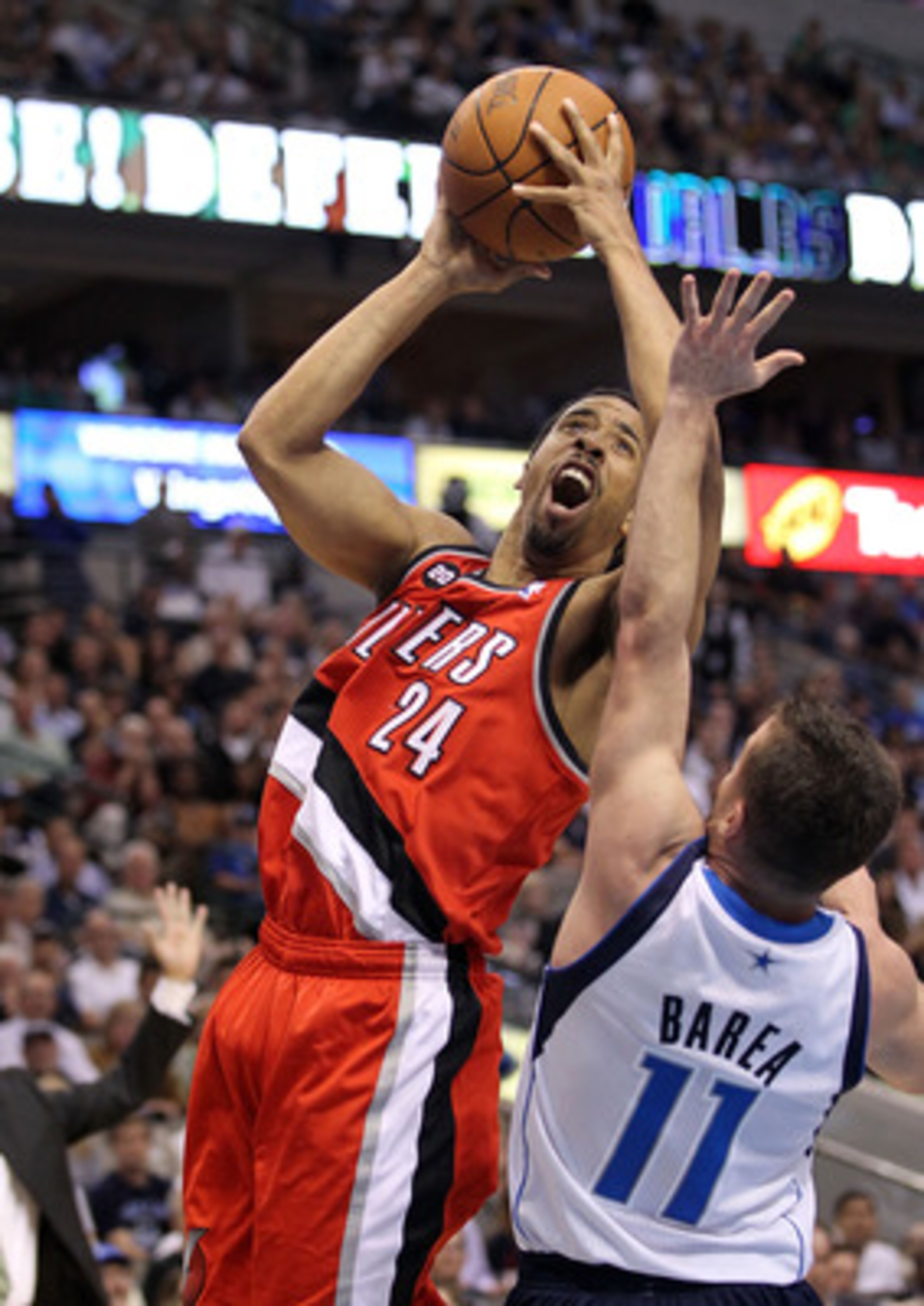DALLAS, TX - APRIL 19: Guard Andre Miller #24 of the Portland Trail Blazers takes a shot against Jose Juan Barea #11 of the Dallas Mavericks in Game Two of the Western Conference Quarterfinals during the 2011 NBA Playoffs on April 19, 2011 at American Ai DALLAS, TX - APRIL 19: Guard Andre Miller #24 of the Portland Trail Blazers takes a shot against Jose Juan Barea #11 of the Dallas Mavericks in Game Two of the Western Conference Quarterfinals during the 2011 NBA Playoffs on April 19, 2011 at American Ai