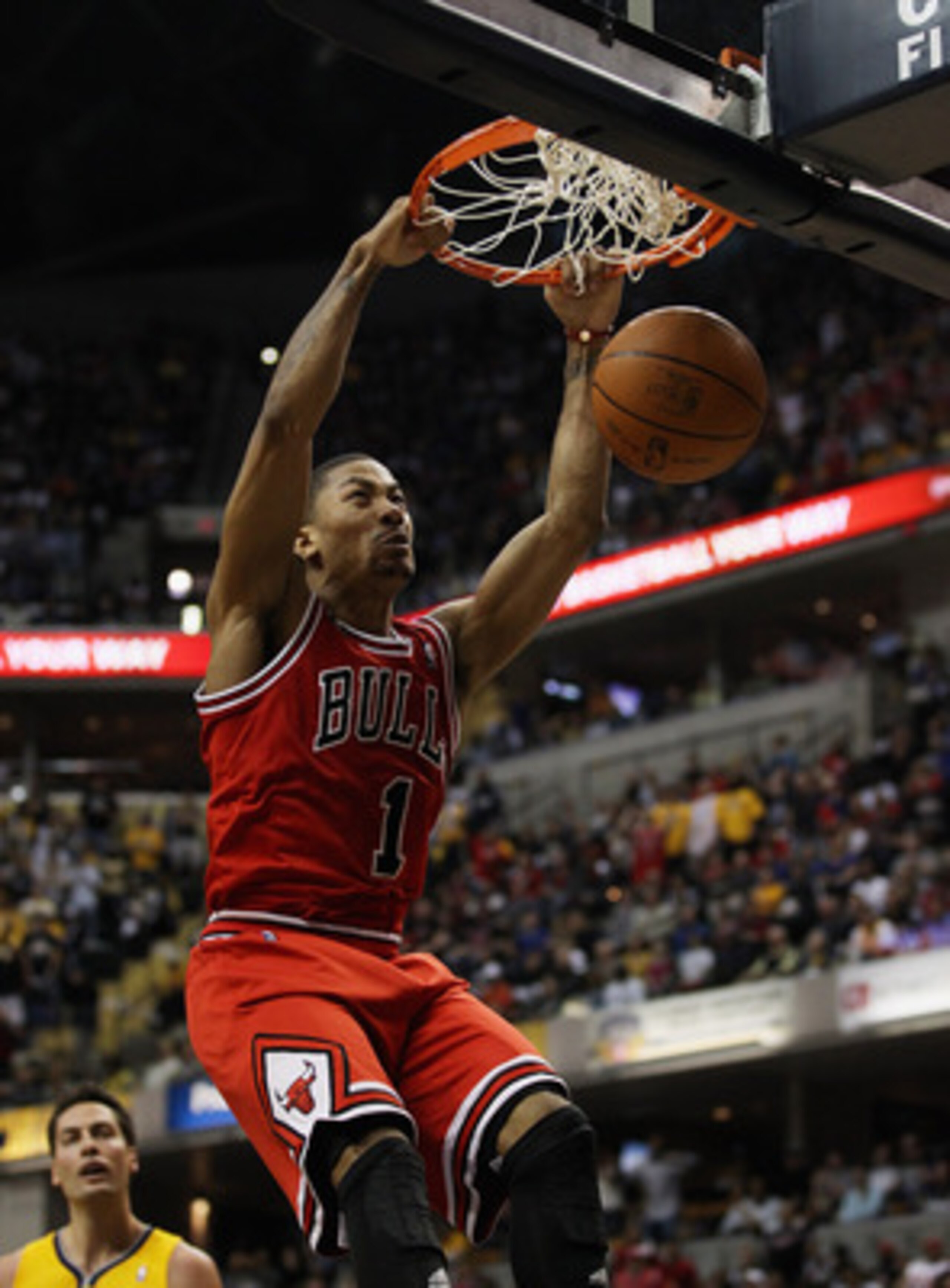 INDIANAPOLIS, IN - APRIL 23: Derrick Rose #1 of the Chicago Bulls dunks the ball against the Indiana Pacers in Game Four of the Eastern Conference Quarterfinals in the 2011 NBA Playoffs at Conseco Fieldhouse on April 23, 2011 in Indianapolis, Indiana. NOT