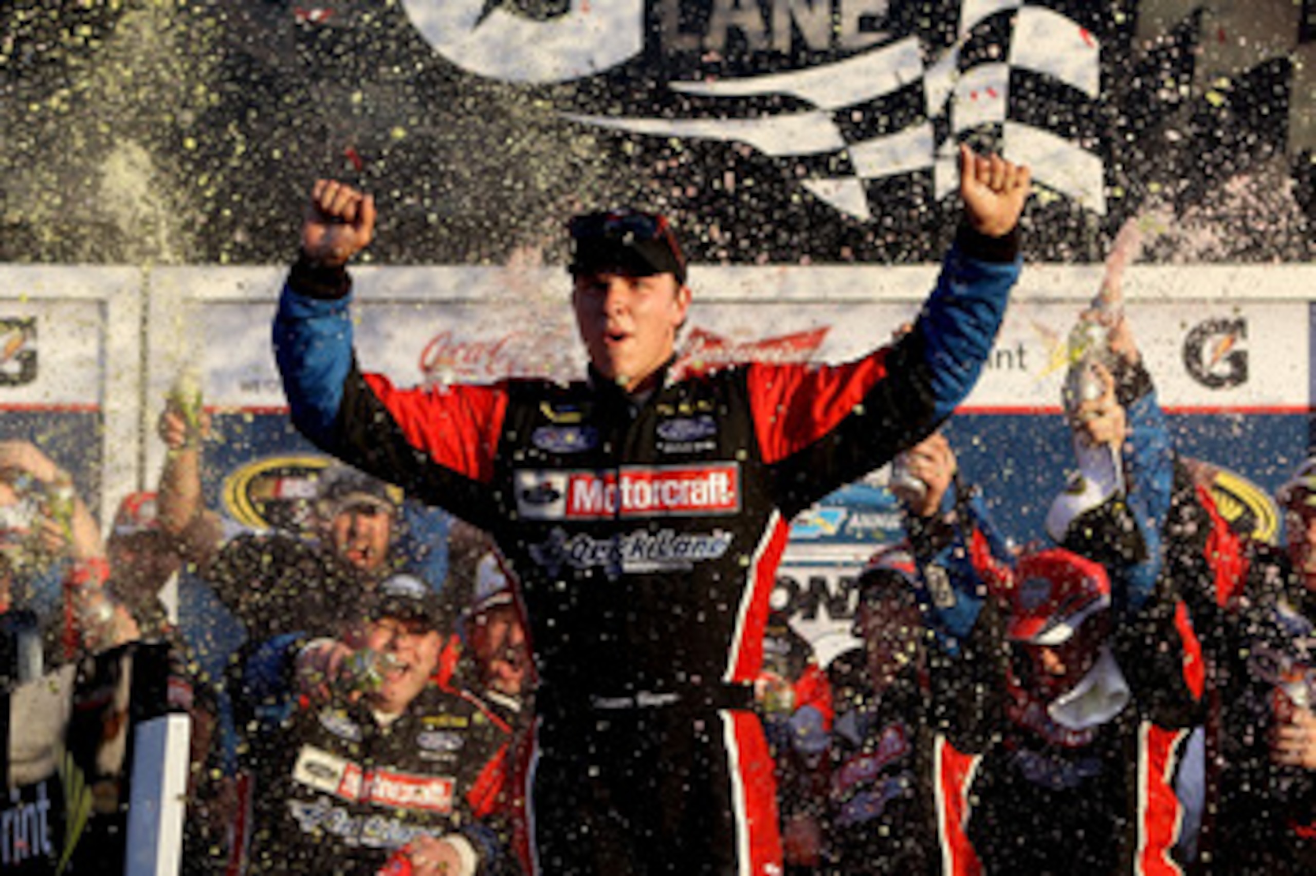 DAYTONA BEACH, FL - FEBRUARY 20: Trevor Bayne, driver of the #21 Motorcraft/Quick Lane Ford, celebrates in Victory Lane after winning the NASCAR Sprint Cup Series Daytona 500 at Daytona International Speedway on February 20, 2011 in Daytona Beach, Florid DAYTONA BEACH, FL - FEBRUARY 20: Trevor Bayne, driver of the #21 Motorcraft/Quick Lane Ford, celebrates in Victory Lane after winning the NASCAR Sprint Cup Series Daytona 500 at Daytona International Speedway on February 20, 2011 in Daytona Beach, Florid