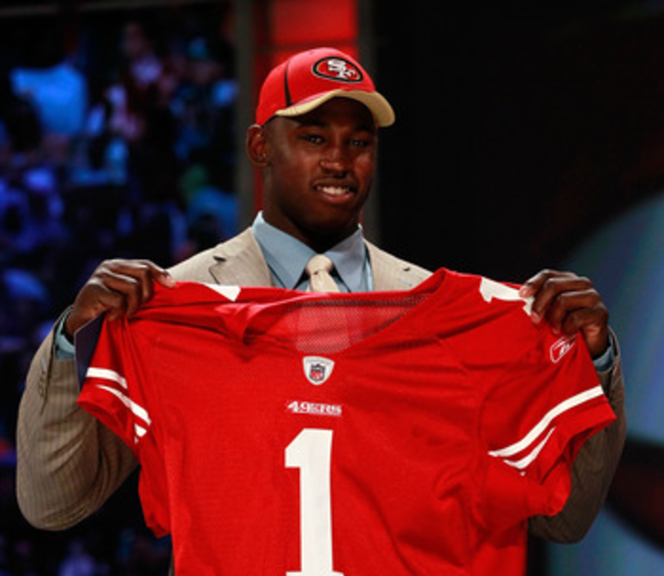 NEW YORK, NY - APRIL 28:  Aldon Smith, #7 overall pick by the San Francisco 49ers, holds up a jersey on stage during the 2011 NFL Draft at Radio City Music Hall on April 28, 2011 in New York City.  (Photo by Chris Trotman/Getty Images)