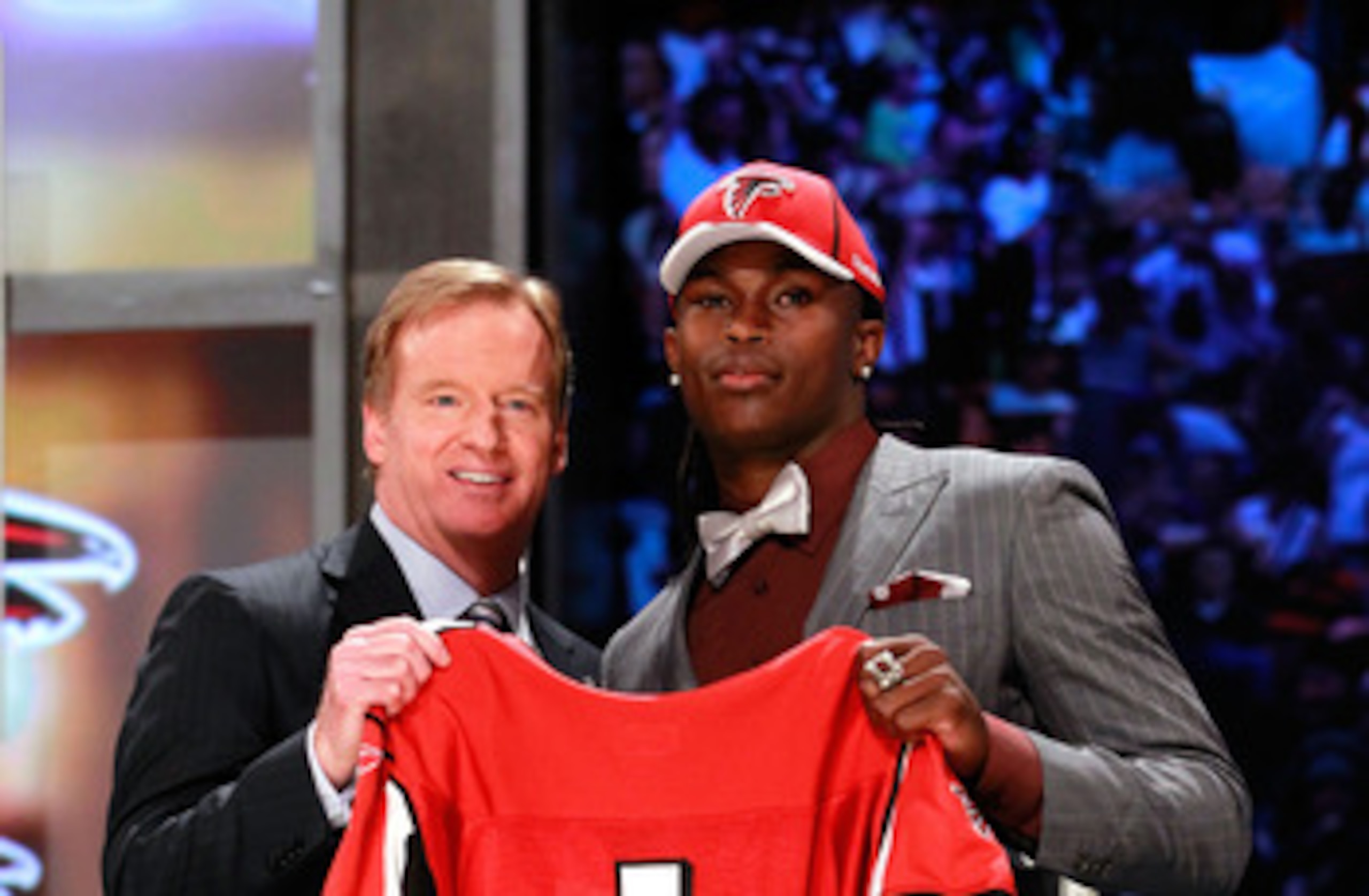 NEW YORK, NY - APRIL 28:  NFL Commissioner Roger Goodell (L) poses for a photo with Julio Jones, #6 overall pick by the Atlanta Falcons, holds up a jersey on stage during the 2011 NFL Draft at Radio City Music Hall on April 28, 2011 in New York City.  (Ph