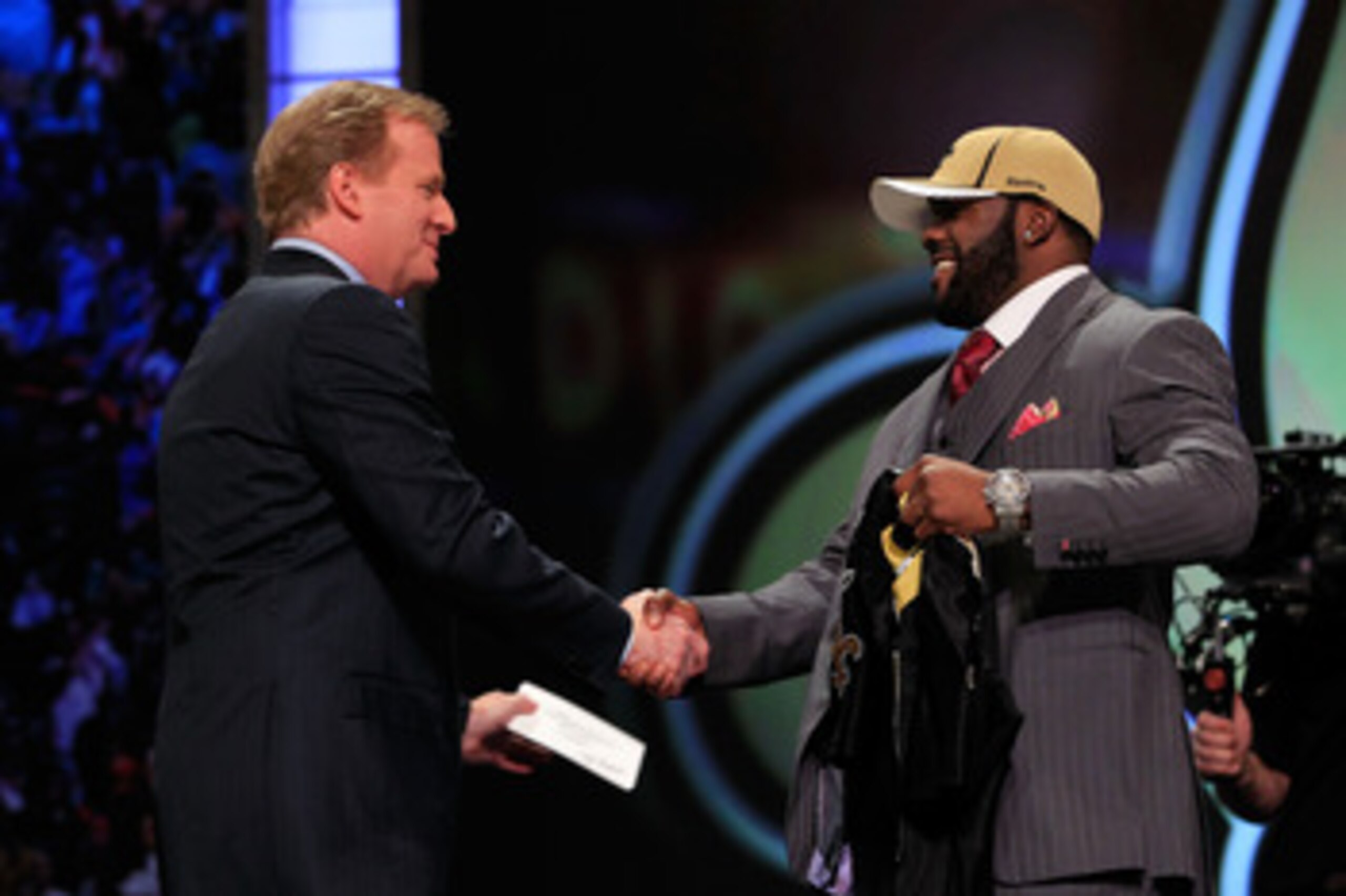 NEW YORK, NY - APRIL 28: NFL Commissioner Roger Goodell (L) greets Mark Ingram, #28 overall pick by the New Orleans Saints, on stage during the 2011 NFL Draft at Radio City Music Hall on April 28, 2011 in New York City. (Photo by Chris Trotman/Getty Ima NEW YORK, NY - APRIL 28: NFL Commissioner Roger Goodell (L) greets Mark Ingram, #28 overall pick by the New Orleans Saints, on stage during the 2011 NFL Draft at Radio City Music Hall on April 28, 2011 in New York City. (Photo by Chris Trotman/Getty Ima