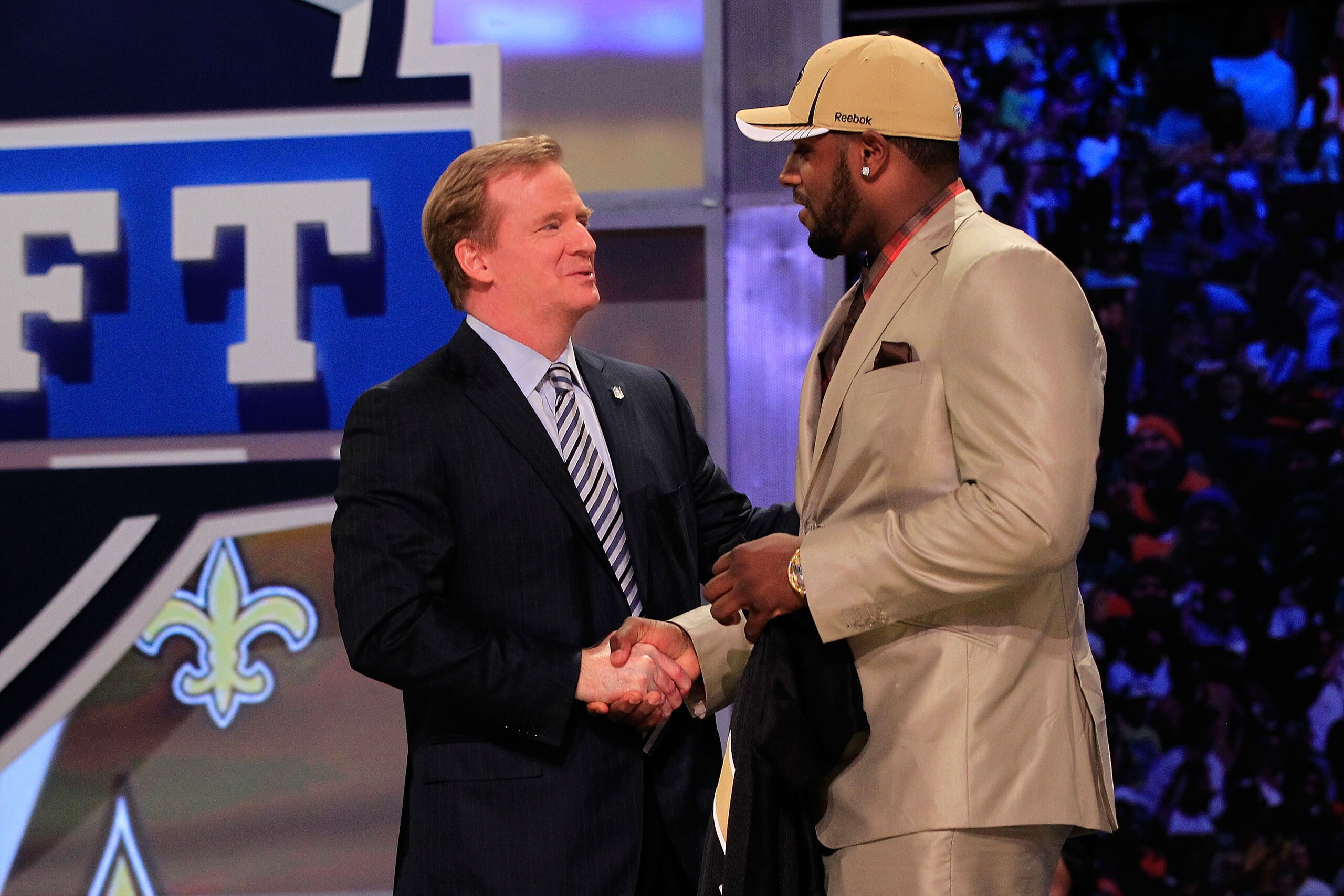 NEW YORK, NY - APRIL 28: NFL Commissioner Roger Goodell (L) greets Cameron Jordan, #24 overall pick by the New Orleans Saints, on stage during the 2011 NFL Draft at Radio City Music Hall on April 28, 2011 in New York City. (Photo by Cameron Jordan/Getty NEW YORK, NY - APRIL 28: NFL Commissioner Roger Goodell (L) greets Cameron Jordan, #24 overall pick by the New Orleans Saints, on stage during the 2011 NFL Draft at Radio City Music Hall on April 28, 2011 in New York City. (Photo by Cameron Jordan/Getty