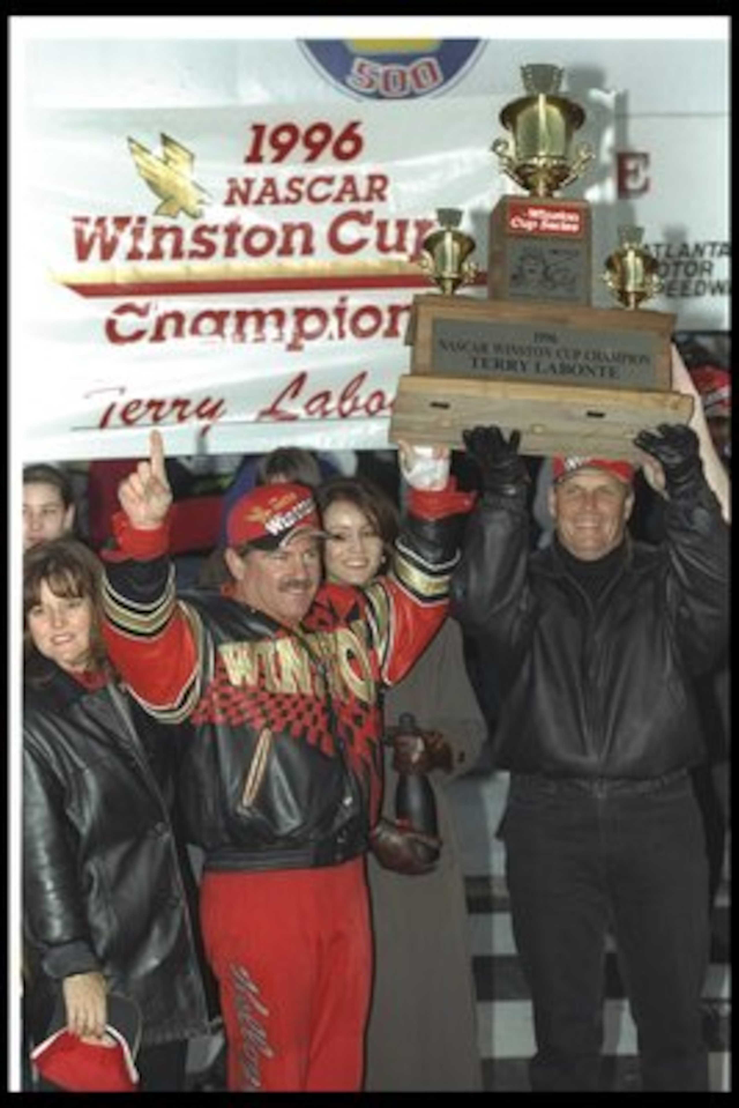 10 Nov 1996: NASCAR driver Terry LaBonte and team owner Rick Hendrick celebrate after the NAPA 500 NASCAR event at the Atlanta Motor Speedway in Hampton, Georgia. Terry Labonte finished fifth and captured the Winston Cup Series points trophy at this even 10 Nov 1996: NASCAR driver Terry LaBonte and team owner Rick Hendrick celebrate after the NAPA 500 NASCAR event at the Atlanta Motor Speedway in Hampton, Georgia. Terry Labonte finished fifth and captured the Winston Cup Series points trophy at this even