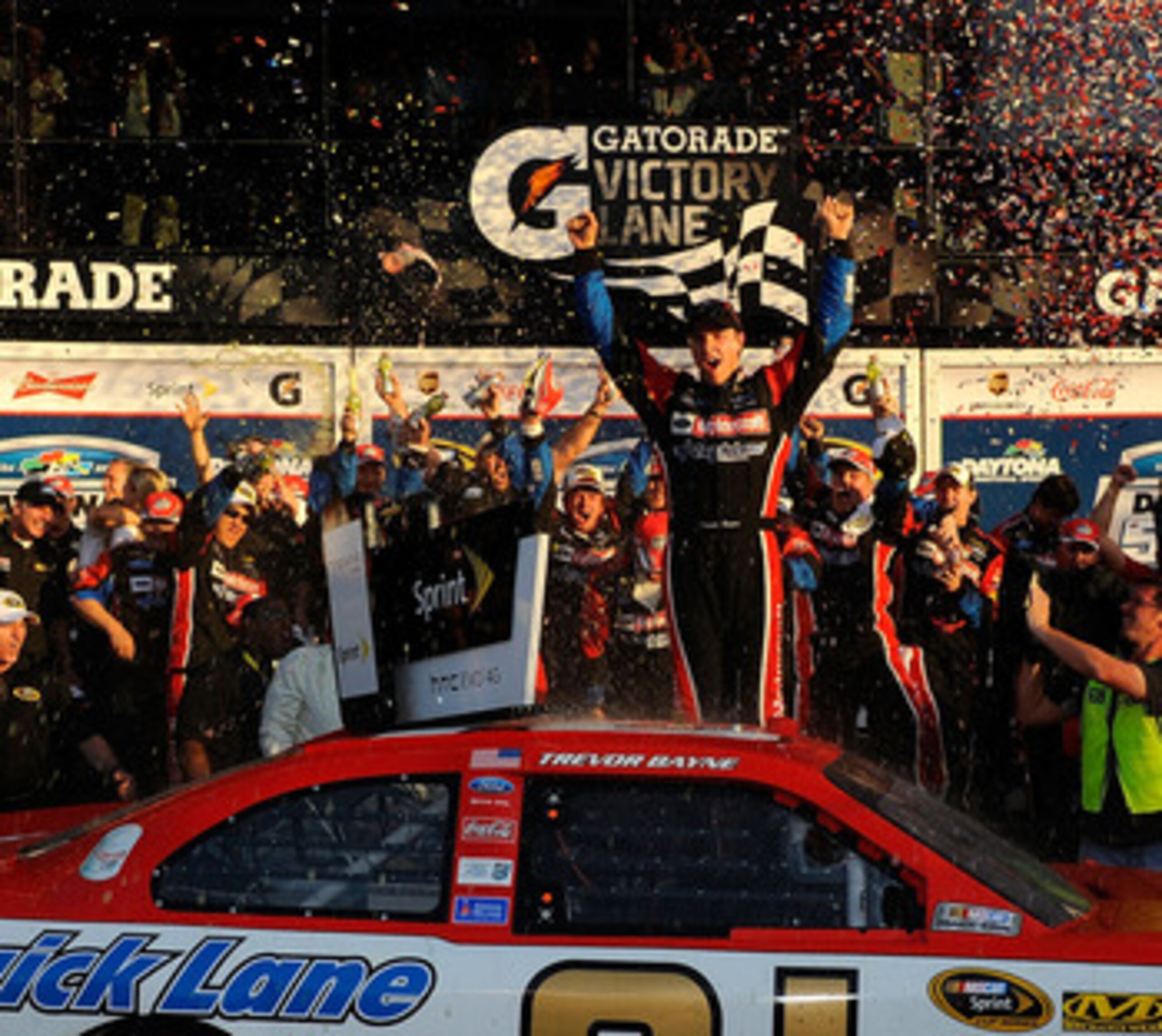DAYTONA BEACH, FL - FEBRUARY 20: Trevor Bayne, driver of the #21 Motorcraft/Quick Lane Ford, celebrates in Victory Lane after winning the NASCAR Sprint Cup Series Daytona 500 at Daytona International Speedway on February 20, 2011 in Daytona Beach, Florid DAYTONA BEACH, FL - FEBRUARY 20: Trevor Bayne, driver of the #21 Motorcraft/Quick Lane Ford, celebrates in Victory Lane after winning the NASCAR Sprint Cup Series Daytona 500 at Daytona International Speedway on February 20, 2011 in Daytona Beach, Florid