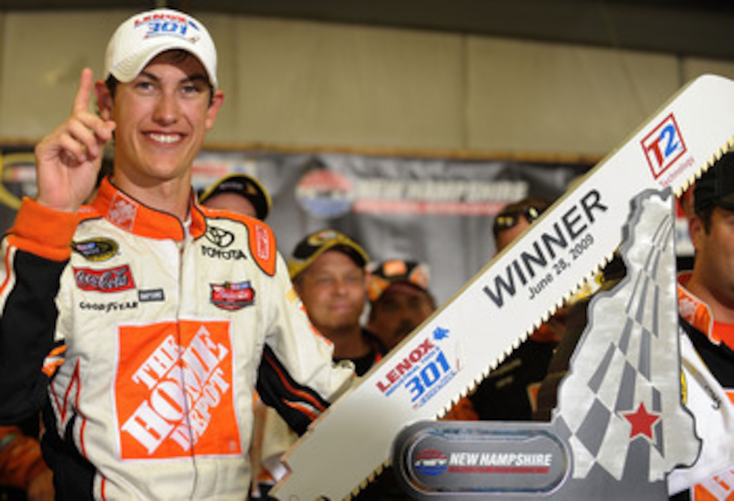 LOUDON, NH - JUNE 28: Joey Logano, driver of the #20 Home Depot Toyota, celebrates winning the NASCAR Sprint Cup Series LENOX Industrial Tools 301 at New Hampshire Motor Speedway on June 28, 2009 in Loudon, New Hampshire. Logano won the rain shortened ra LOUDON, NH - JUNE 28: Joey Logano, driver of the #20 Home Depot Toyota, celebrates winning the NASCAR Sprint Cup Series LENOX Industrial Tools 301 at New Hampshire Motor Speedway on June 28, 2009 in Loudon, New Hampshire. Logano won the rain shortened ra
