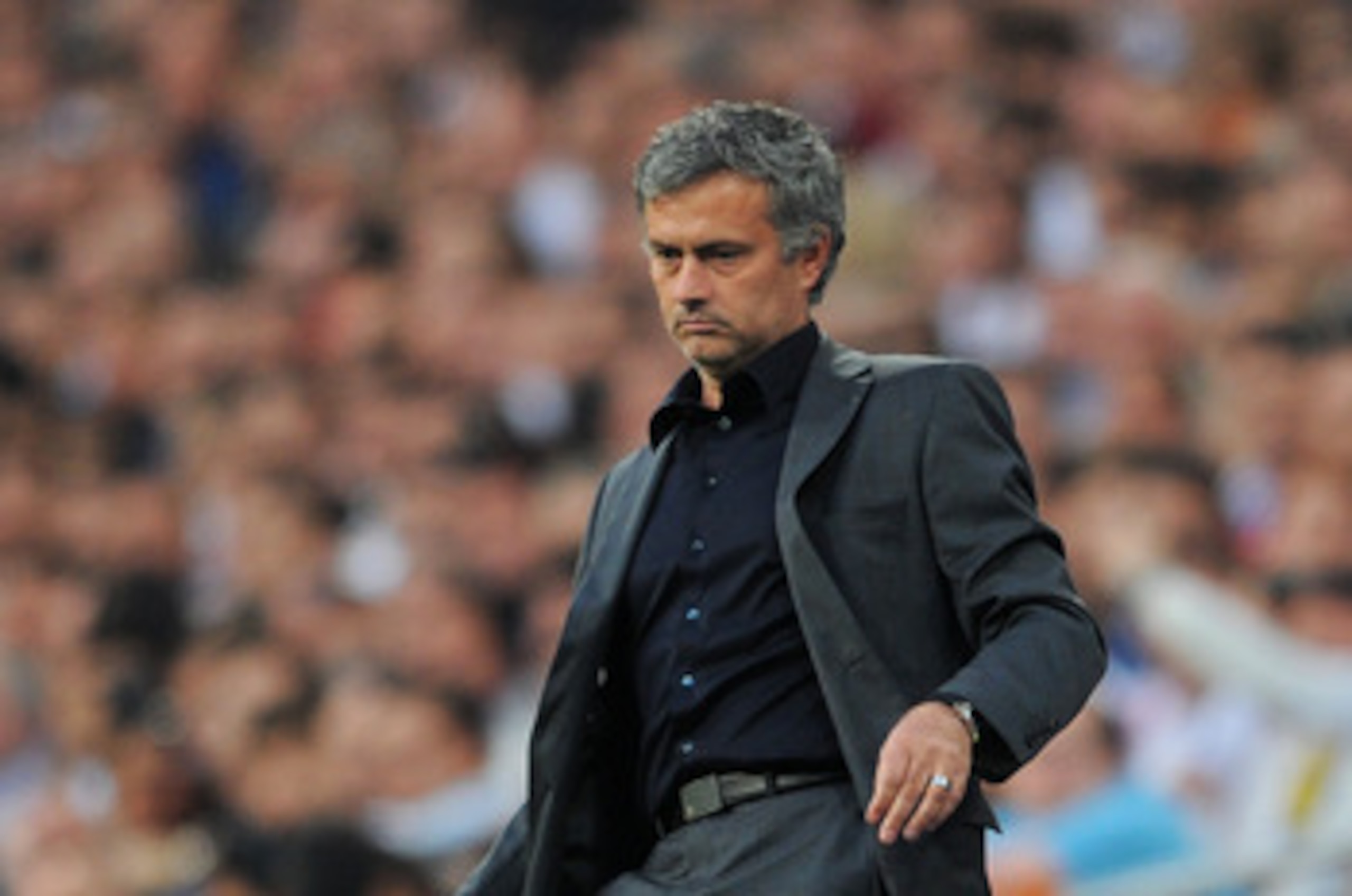 MADRID, SPAIN - APRIL 27: Head coach Jose Mourinho of Real Madrid strikes the ball during the UEFA Champions League Semi Final first leg match between Real Madrid and Barcelona at the Estadio Santiago Bernabeu on April 27, 2011 in Madrid, Spain. (Photo MADRID, SPAIN - APRIL 27: Head coach Jose Mourinho of Real Madrid strikes the ball during the UEFA Champions League Semi Final first leg match between Real Madrid and Barcelona at the Estadio Santiago Bernabeu on April 27, 2011 in Madrid, Spain. (Photo