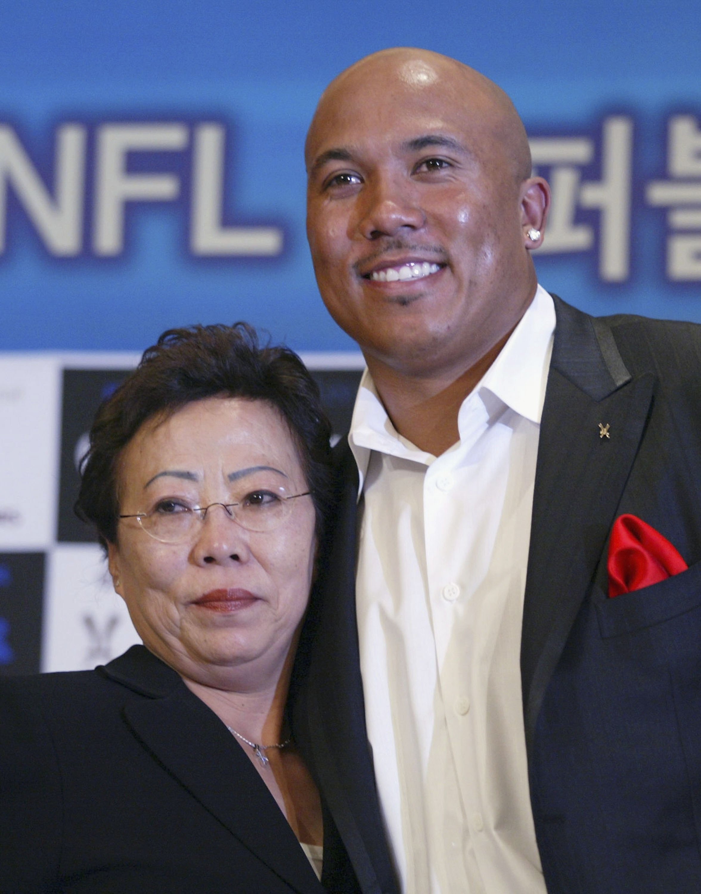 SEOUL, SOUTH KOREA - APRIL 11: Hines Ward of the Pittsburgh Steelers and his mother Kim Young-Hee attend their farewell news conference on April 11, 2006 in Seoul, South Korea. South Korea gave the American football star, who left the country as a toddler