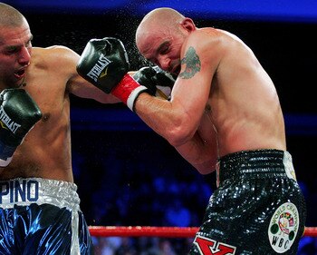 YOUNGSTOWN, OH - DECEMBER 19:  Kelly Pavlik (R) fights against Miguel Espino during their match at the Beeghly Center on December 19, 2009 in Youngstown, Ohio.  (Photo by Jared Wickerham/Getty Images)