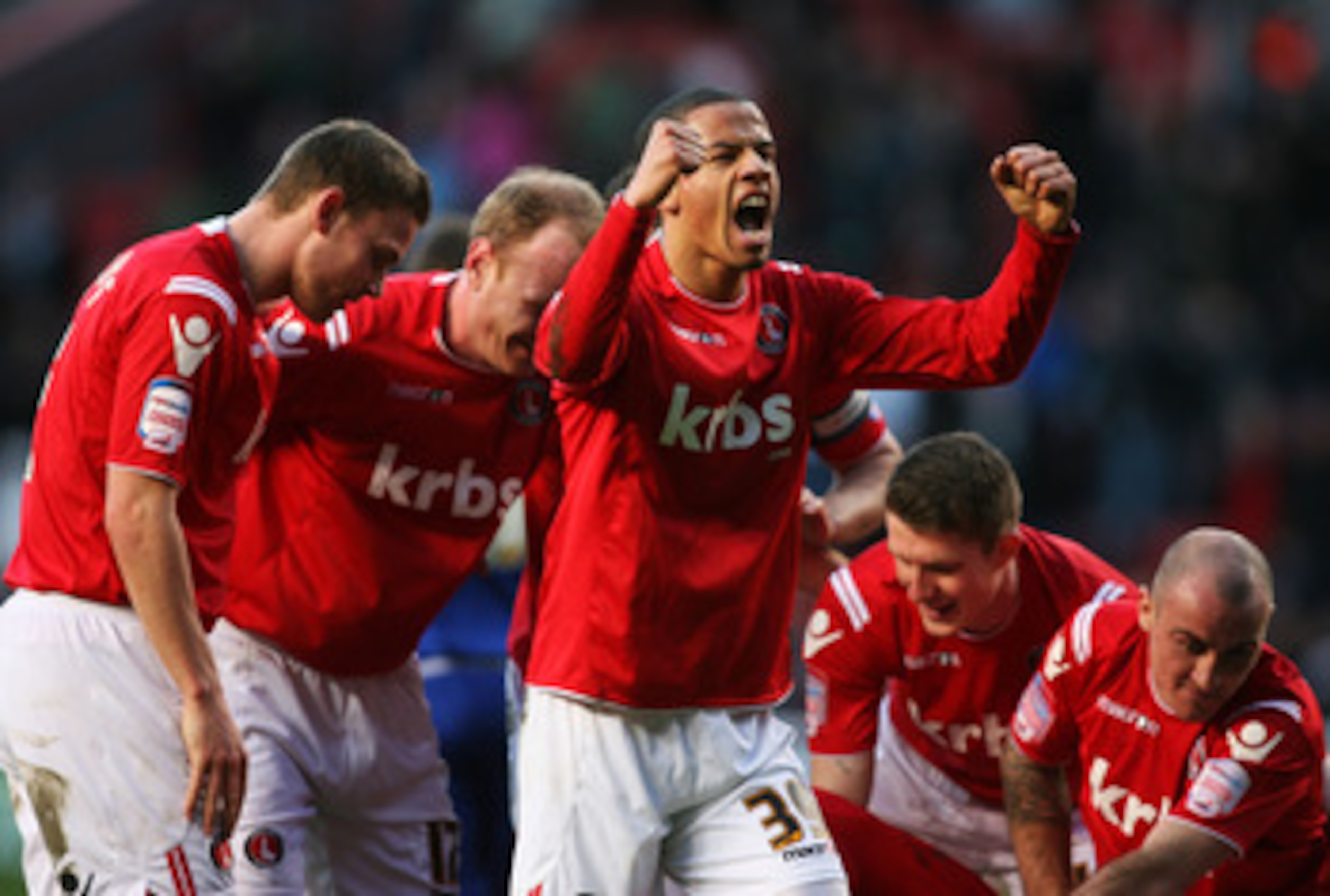 LONDON, ENGLAND - FEBRUARY 12: Nathan Eccleston of Charlton Athletic celebrates with team mates during the npower League One match between Charlton Athletic and Peterborough United at The Valley on February 12, 2011 in London, England. (Photo by Mark Wiel LONDON, ENGLAND - FEBRUARY 12: Nathan Eccleston of Charlton Athletic celebrates with team mates during the npower League One match between Charlton Athletic and Peterborough United at The Valley on February 12, 2011 in London, England. (Photo by Mark Wiel