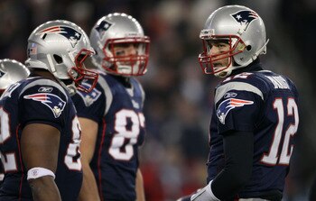 FOXBORO, MA - JANUARY 16:  Quarterback Tom Brady #12 of the New England Patriots stands on the field during their 2011 AFC divisional playoff game against the New York Jets at Gillette Stadium on January 16, 2011 in Foxboro, Massachusetts.  (Photo by Elsa