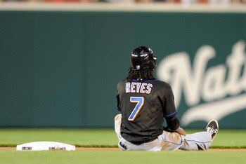 NEW YORK, NY - APRIL 22: Jose Reyes #7 of the New York Mets tags out Chris Young #24 of the Arizona Diamondbacks at second base at Citi Field on April 22, 2011 in the Flushing neighborhood of the Queens borough of New York City.  (Photo by Chris Trotman/G