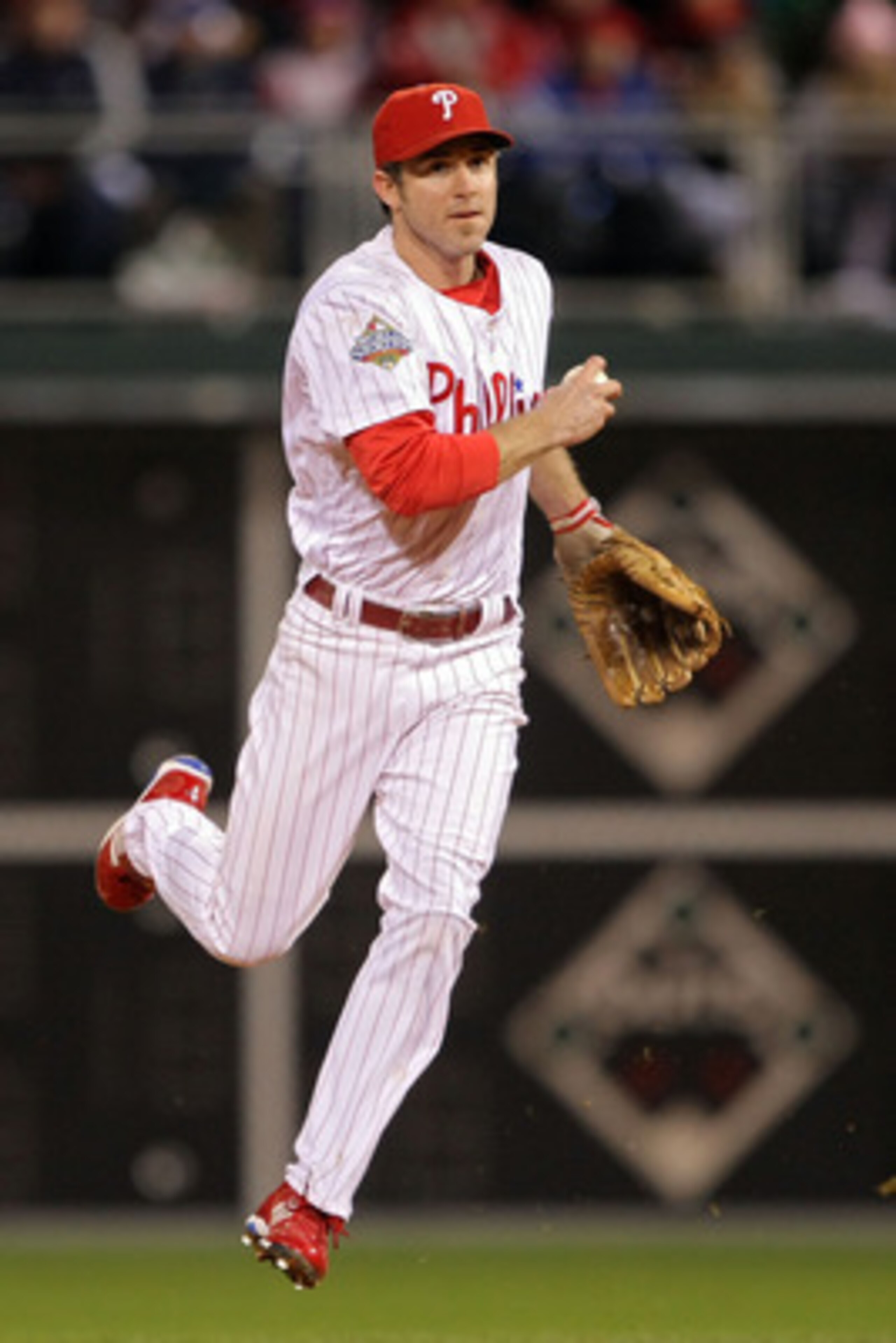 PHILADELPHIA - OCTOBER 29:  Chase Utley #26 of the Philadelphia Phillies fakes a throw to first which allowed him to throw out Jason Bartlett #8 of the Tampa Bay Rays on a ball hit by Akinori Iwamura of the Rays in the top of the seventh inning during the