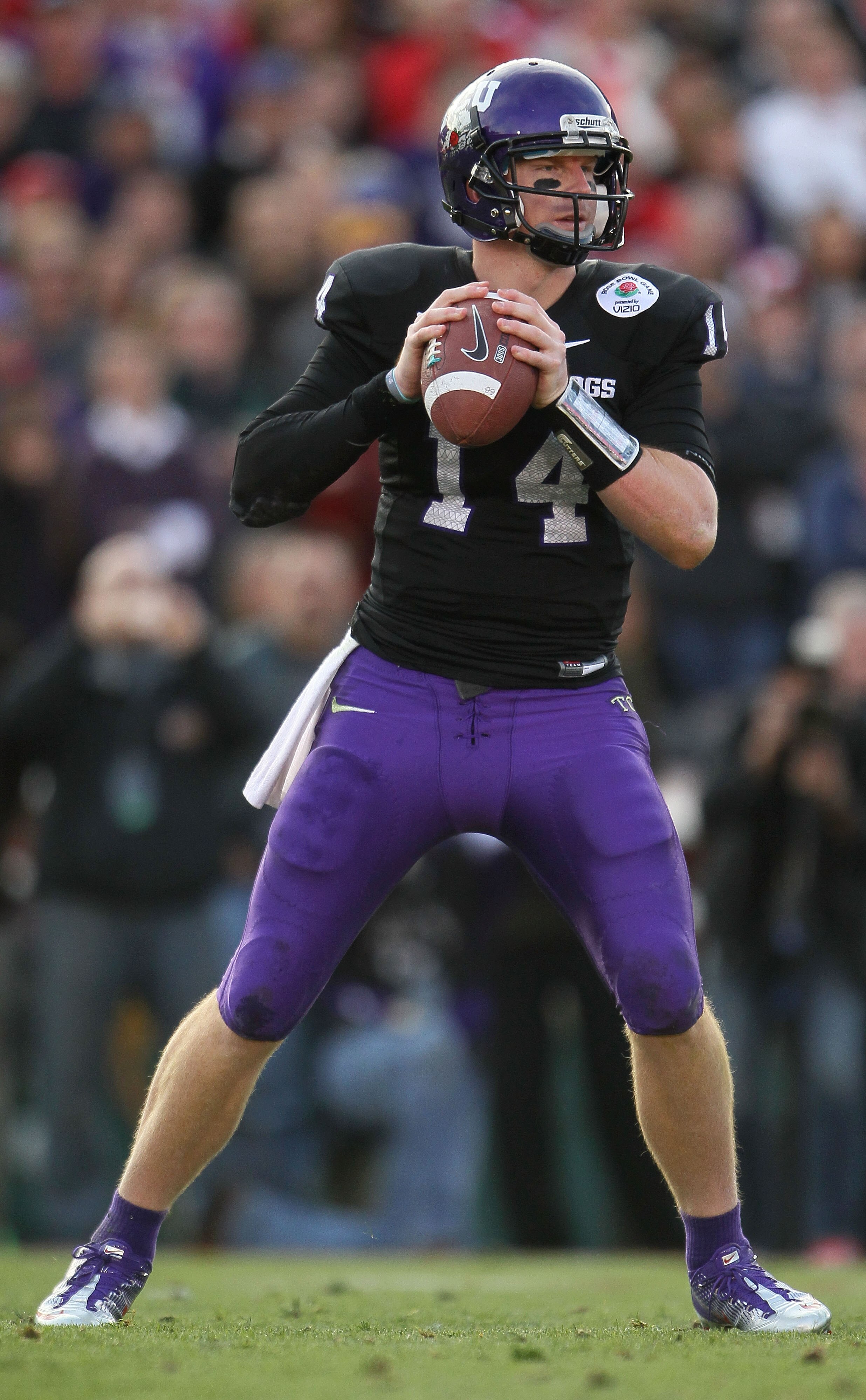 PASADENA, CA - JANUARY 01:  Quarterback Andy Dalton #14 of the TCU Horned Frogs looks to pass against the Wisconsin Badgers in the 97th Rose Bowl game on January 1, 2011 in Pasadena, California.  (Photo by Jeff Gross/Getty Images)
