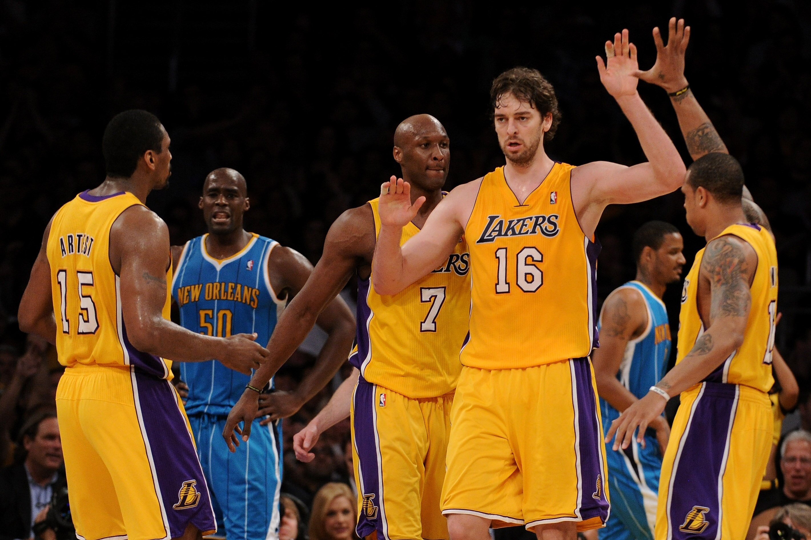 LOS ANGELES, CA - APRIL 26:  Pau Gasol #16 of the Los Angeles Lakers reacts in the third quarter with teammates Ron Artest #15 and Shannon Brown #12 while taking on the New Orleans Hornets in Game Five of the Western Conference Quarterfinals in the 2011 N