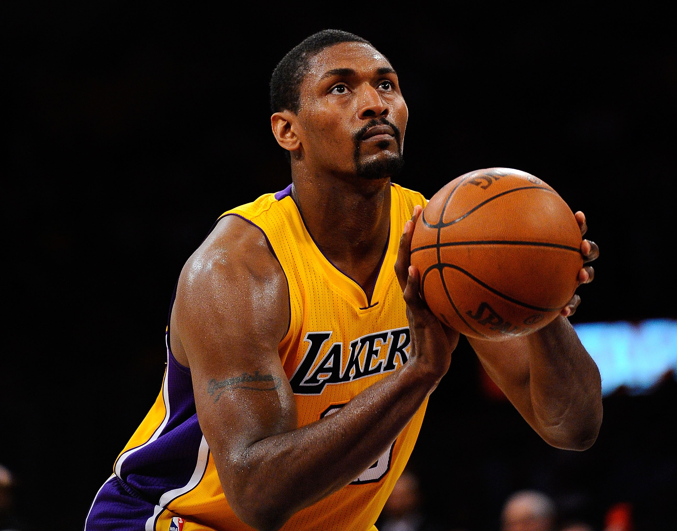 LOS ANGELES, CA - APRIL 20:  Ron Artest #15 of the Los Angeles Lakers shoots a free throw while taking on the New Orleans Hornets in Game Two of the Western Conference Quarterfinals in the 2011 NBA Playoffs on April 20, 2011 at Staples Center in Los Angel