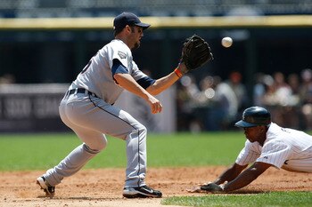 CHICAGO, IL- JUNE 5: Ryan Raburn #25 of the Detroit Tigers catches the baseball as Juan Pierre #1 of the Chicago White Sox slides into second base at U.S. Cellular Field on June 5, 2011 in Chicago, Illinois. (Photo by Scott Boehm/Getty Images)