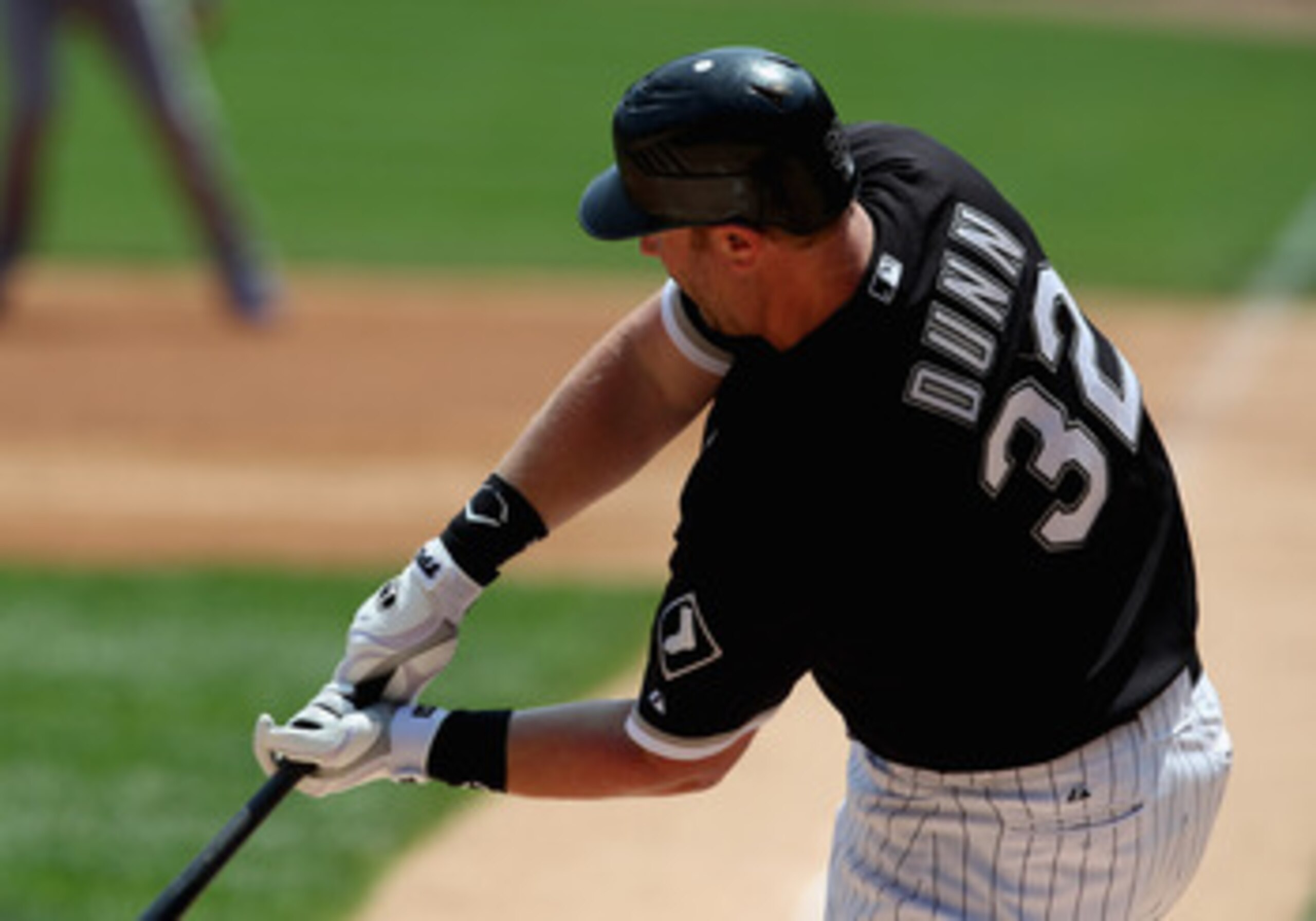 CHICAGO, IL - MAY 22:  Adam Dunn #32 of the Chicago White Sox  takes a swing against the Los Angeles Dodgers at U.S. Cellular Field on May 22, 2011 in Chicago, Illinois. The White Sox defeated the Dodgers 8-3.  (Photo by Jonathan Daniel/Getty Images)