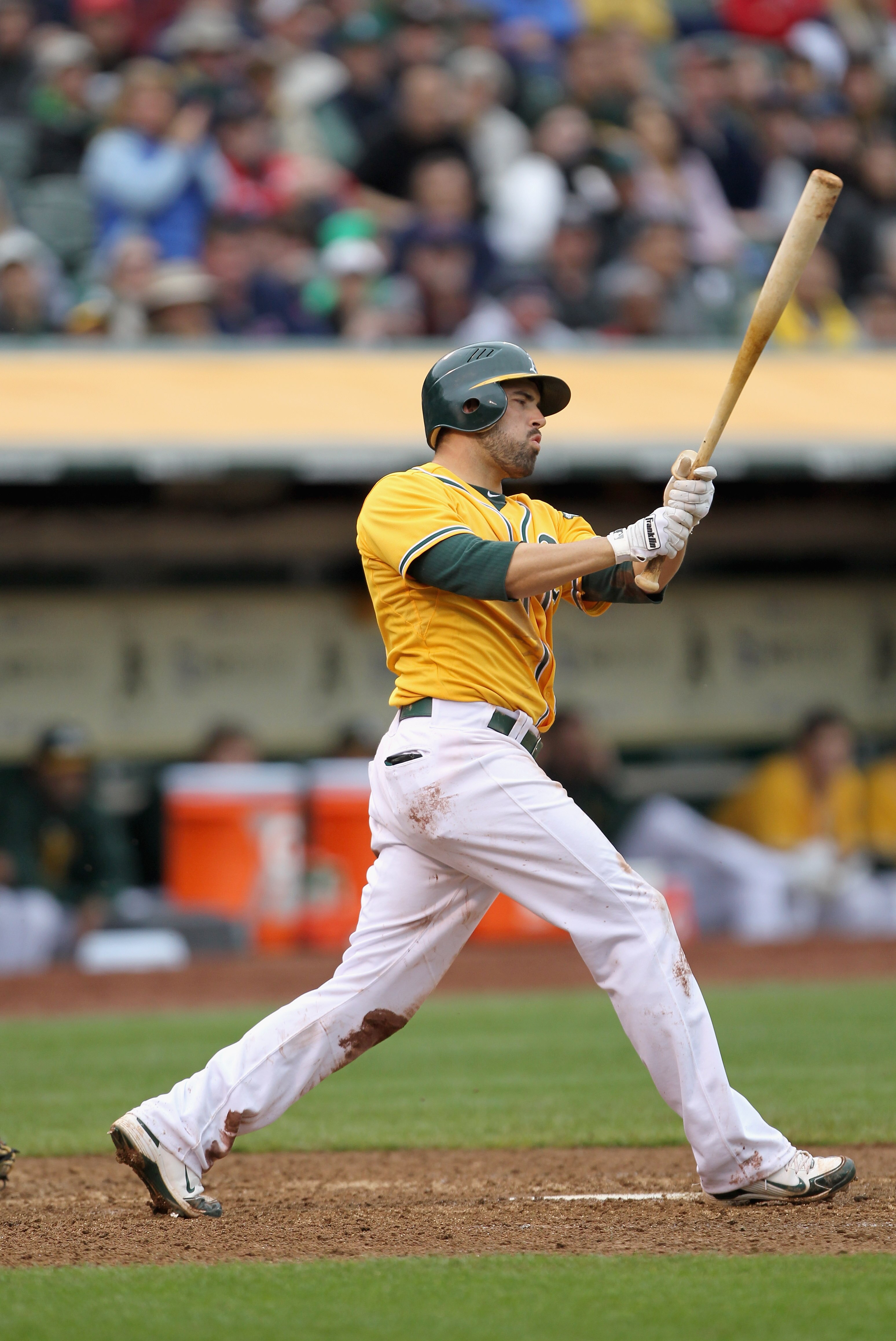 OAKLAND, CA - APRIL 20:  David DeJesus #12 of the Oakland Athletics in action against the Boston Red Sox at Oakland-Alameda County Coliseum on April 20, 2011 in Oakland, California.  (Photo by Ezra Shaw/Getty Images)