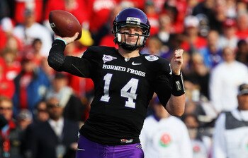 PASADENA, CA - JANUARY 01:  Quarterback Andy Dalton #14 of the TCU Horned Frogs looks to pass against the Wisconsin Badgers during the 97th Rose Bowl game on January 1, 2011 in Pasadena, California.  (Photo by Stephen Dunn/Getty Images)