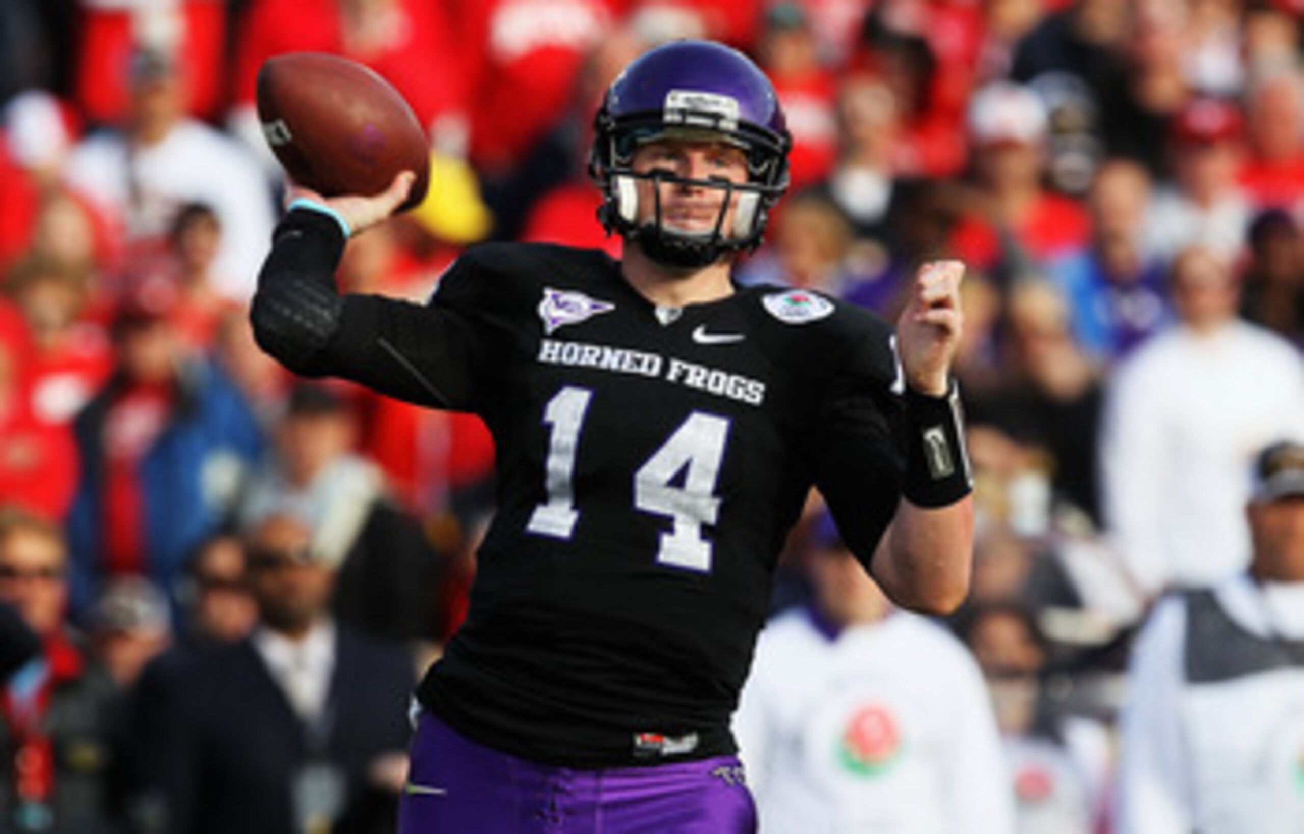 PASADENA, CA - JANUARY 01: Quarterback Andy Dalton #14 of the TCU Horned Frogs looks to pass against the Wisconsin Badgers during the 97th Rose Bowl game on January 1, 2011 in Pasadena, California. (Photo by Stephen Dunn/Getty Images) PASADENA, CA - JANUARY 01: Quarterback Andy Dalton #14 of the TCU Horned Frogs looks to pass against the Wisconsin Badgers during the 97th Rose Bowl game on January 1, 2011 in Pasadena, California. (Photo by Stephen Dunn/Getty Images)