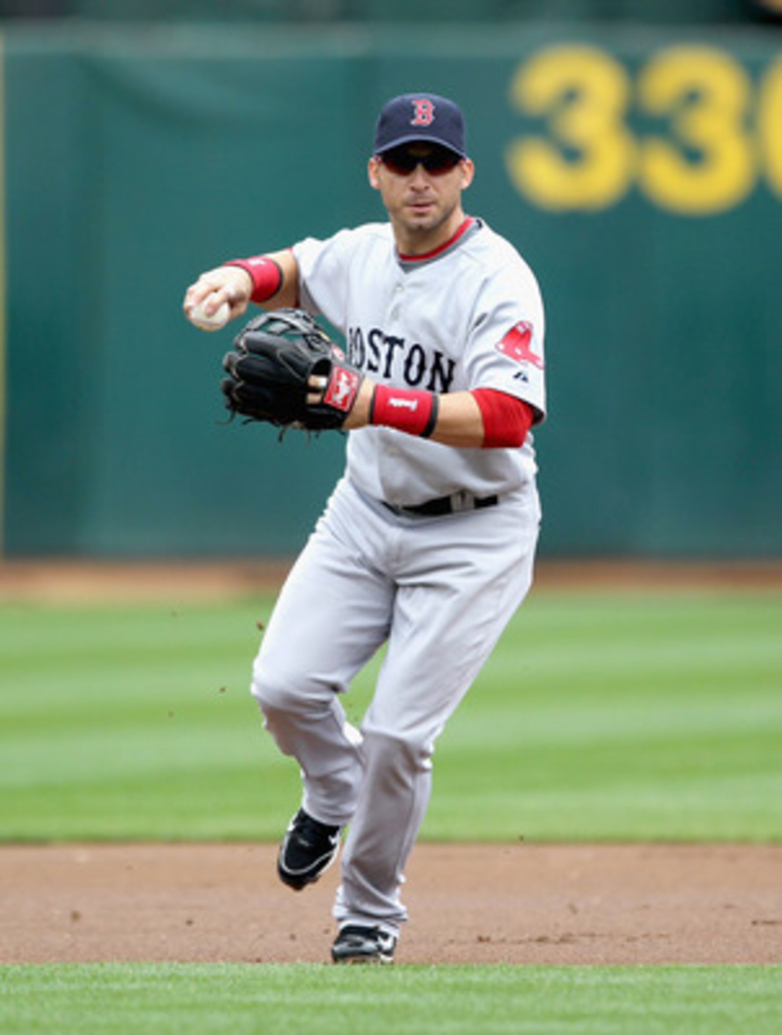 OAKLAND, CA - APRIL 20:  Marco Scutaro #10 of the Boston Red Sox in action against the Oakland Athletics at Oakland-Alameda County Coliseum on April 20, 2011 in Oakland, California.  (Photo by Ezra Shaw/Getty Images)