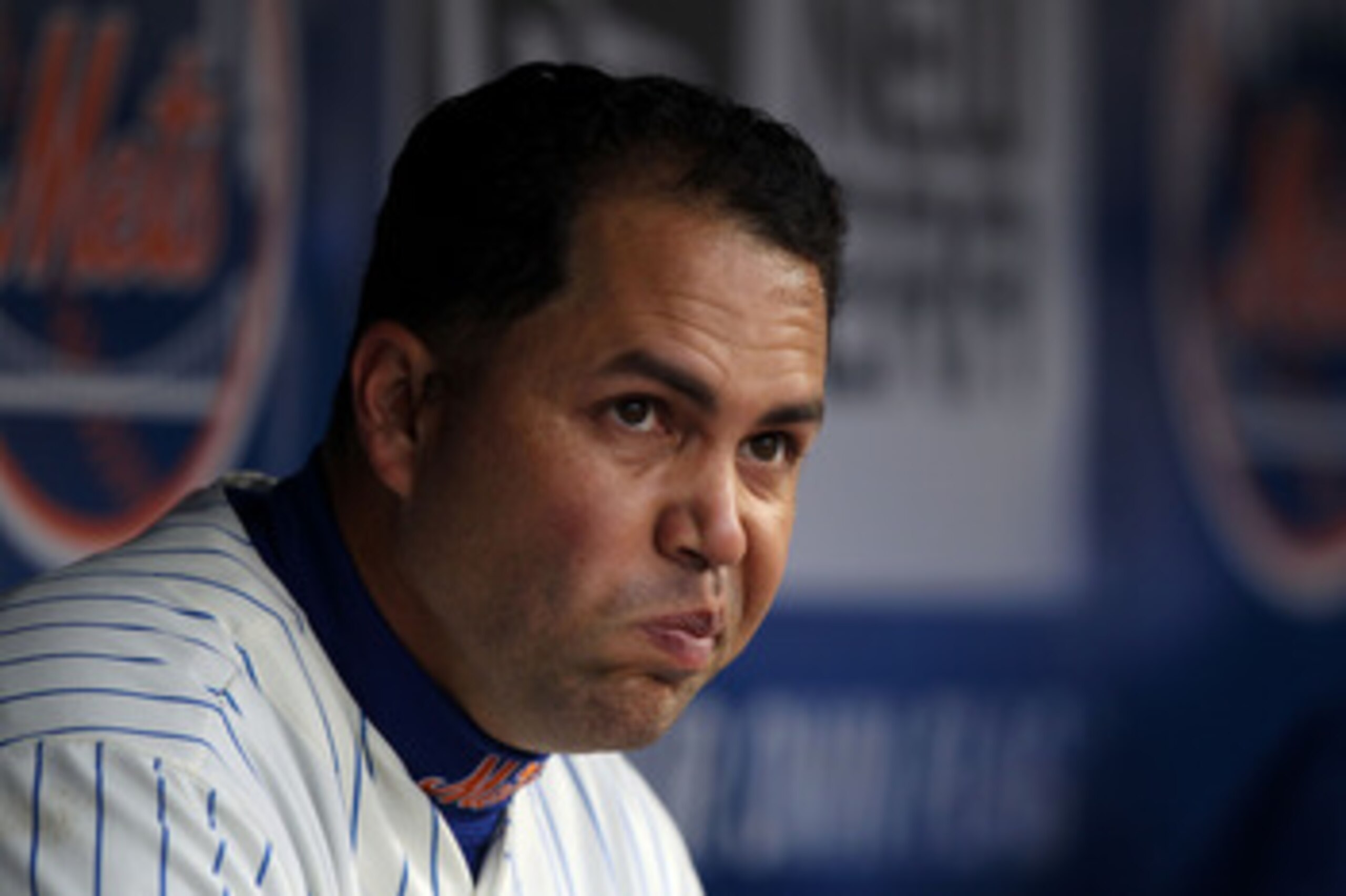 NEW YORK, NY - APRIL 08:  Carlos Beltran #15 of the New York Mets looks on from the dugout against the Washington Nationals during the Mets' Home Opener at Citi Field on April 8, 2011 in the Flushing neighborhood of Queens in New York City.  (Photo by Al 