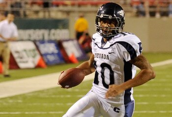 LAS VEGAS - OCTOBER 02:  Quarterback Colin Kaepernick #10 of the Nevada Reno Wolf Pack runs for a touchdown against the UNLV Rebels in the first quarter of their game at Sam Boyd Stadium October 2, 2010 in Las Vegas, Nevada. Nevada Reno won 44-26.  (Photo