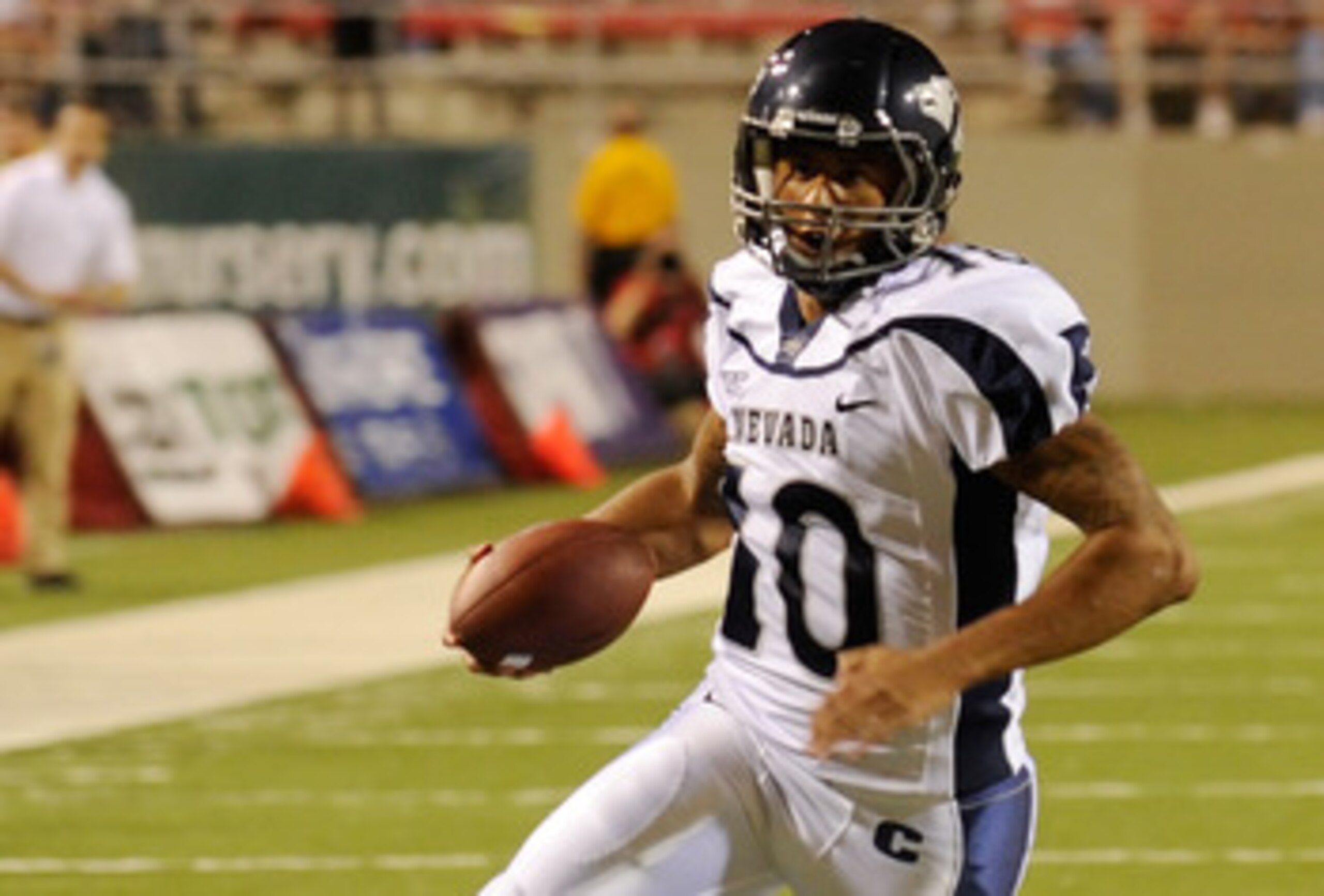 LAS VEGAS - OCTOBER 02: Quarterback Colin Kaepernick #10 of the Nevada Reno Wolf Pack runs for a touchdown against the UNLV Rebels in the first quarter of their game at Sam Boyd Stadium October 2, 2010 in Las Vegas, Nevada. Nevada Reno won 44-26. (Photo LAS VEGAS - OCTOBER 02: Quarterback Colin Kaepernick #10 of the Nevada Reno Wolf Pack runs for a touchdown against the UNLV Rebels in the first quarter of their game at Sam Boyd Stadium October 2, 2010 in Las Vegas, Nevada. Nevada Reno won 44-26. (Photo