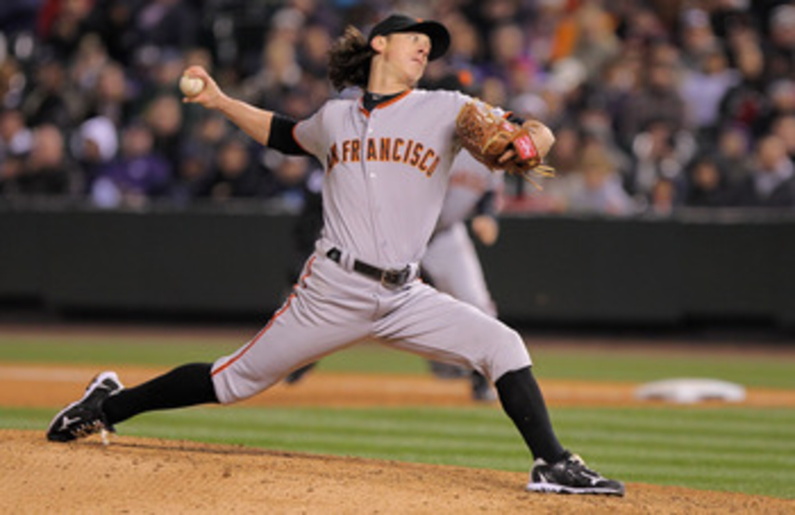 DENVER, CO - APRIL 18:  Starting pitcher Tim Lincecum #55 of the San Francisco Giants works against the Colorado Rockies at Coors Field on April 18, 2011 in Denver, Colorado. Lincecum recorded 10 strike outs as he earned the win as the Giants defeated the