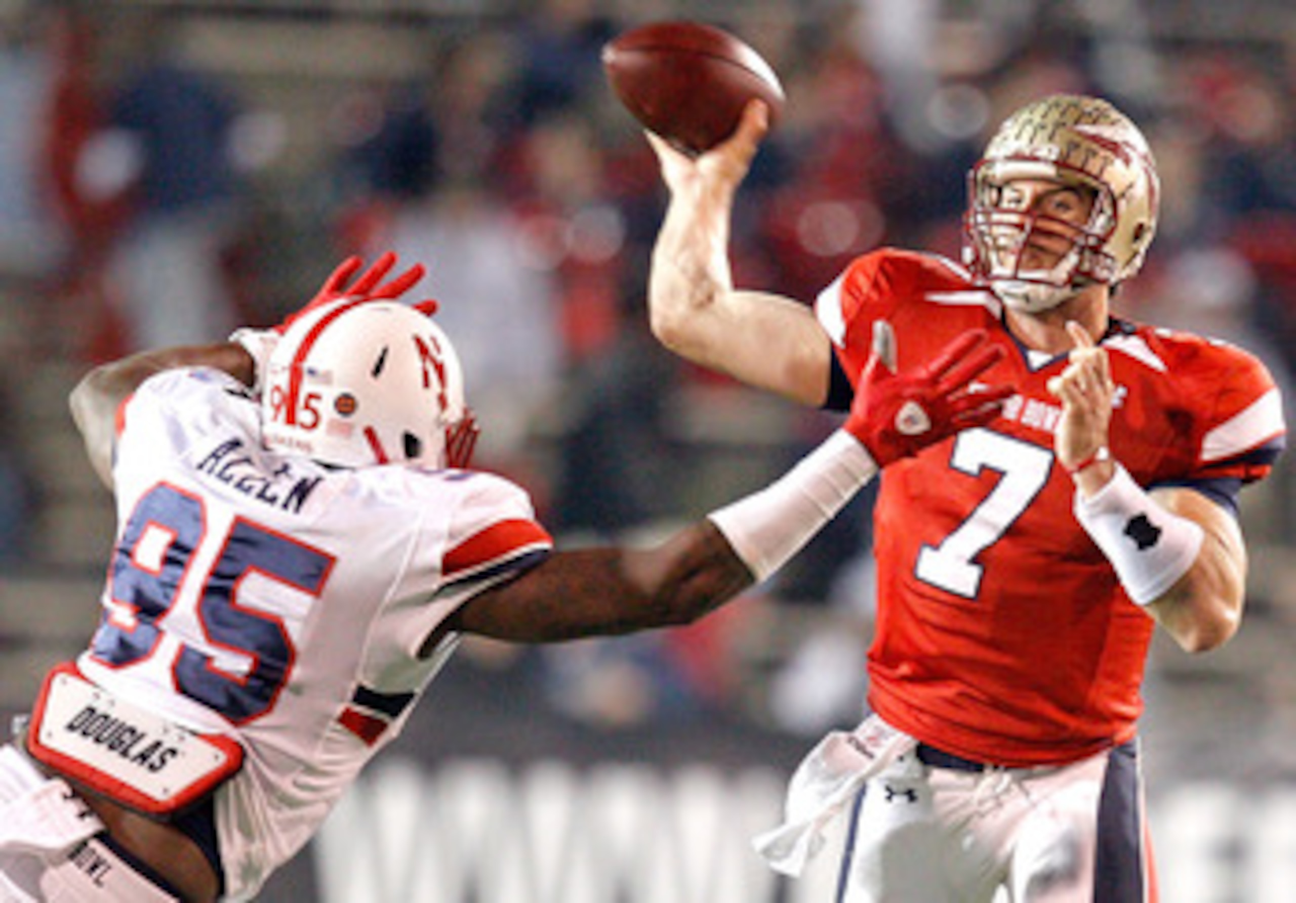 MOBILE, AL - JANUARY 29: Quarterback Christian Ponder #7 of the South Team passes over defensive lineman Pierre Allen #95 North Team during the fourth quarter of the Under Armour Senior Bowl on January 29, 2011 at Ladd-Pebbles Stadium in Mobile, Alabama. MOBILE, AL - JANUARY 29: Quarterback Christian Ponder #7 of the South Team passes over defensive lineman Pierre Allen #95 North Team during the fourth quarter of the Under Armour Senior Bowl on January 29, 2011 at Ladd-Pebbles Stadium in Mobile, Alabama.
