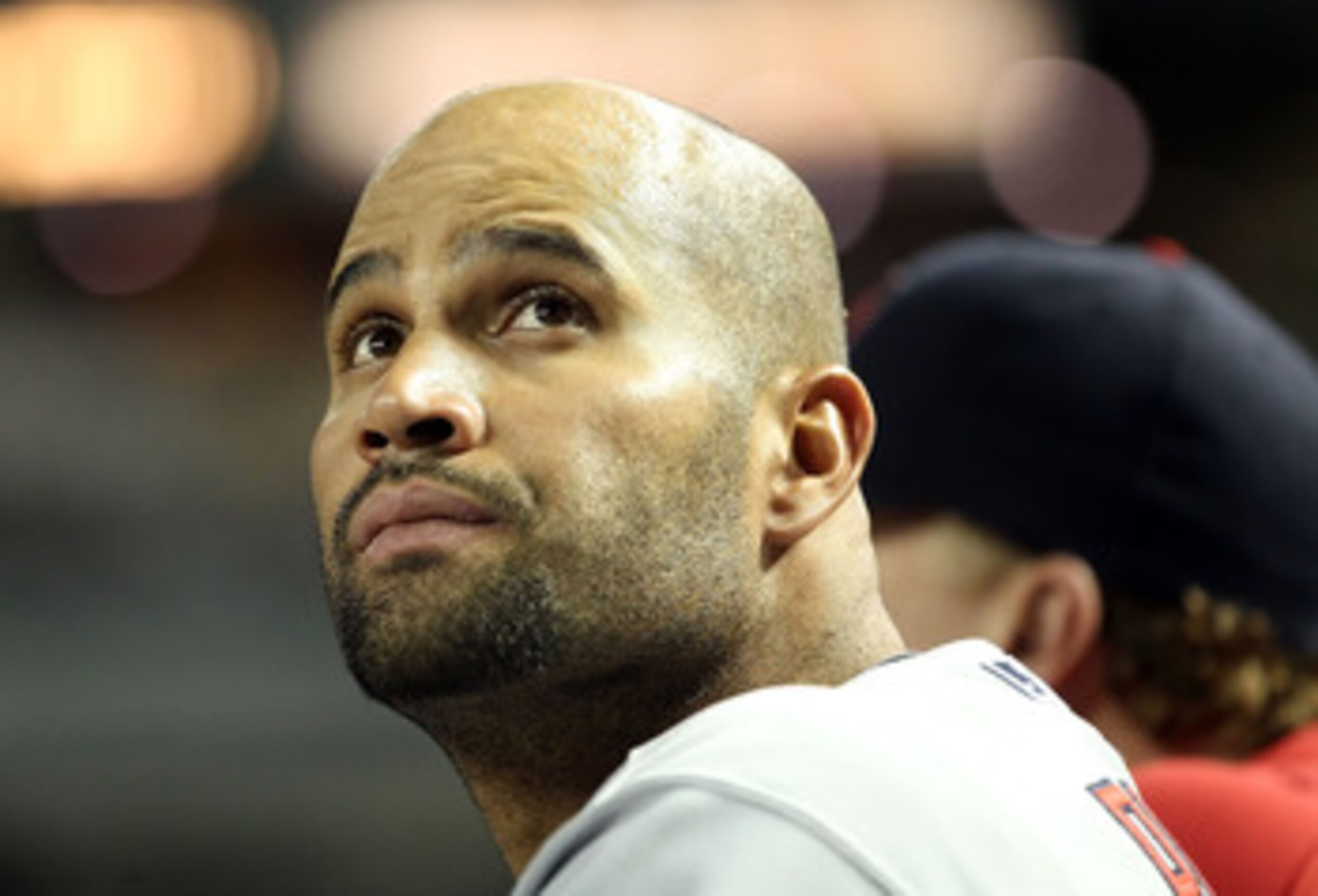 PHOENIX, AZ - APRIL 12:  Albert Pujols #5 of the St. Louis Cardinals stands in the dugout during the Major League Baseball game against the Arizona Diamondbacks at Chase Field on April 12, 2011 in Phoenix, Arizona. The Diamondbacks defeated the Cardinals 