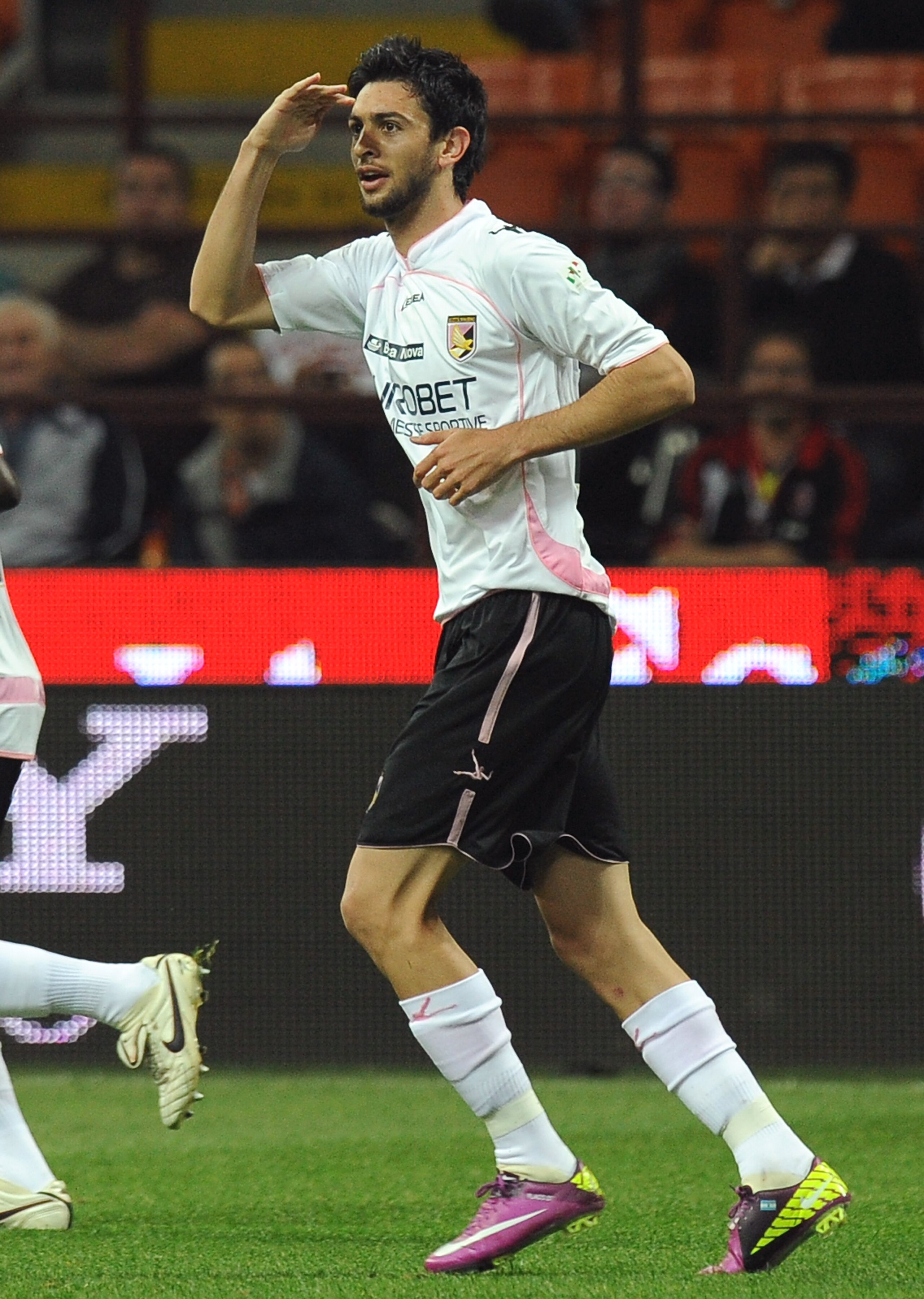 MILAN, ITALY - APRIL 20:  Javier Pastore  of Palermo celebrates after scoring the equalizing goal during the TIM Cup semifinal match between AC Milan and US Citta di Palermo at Stadio Giuseppe Meazza on April 20, 2011 in Milan, Italy.  (Photo by Tullio M.