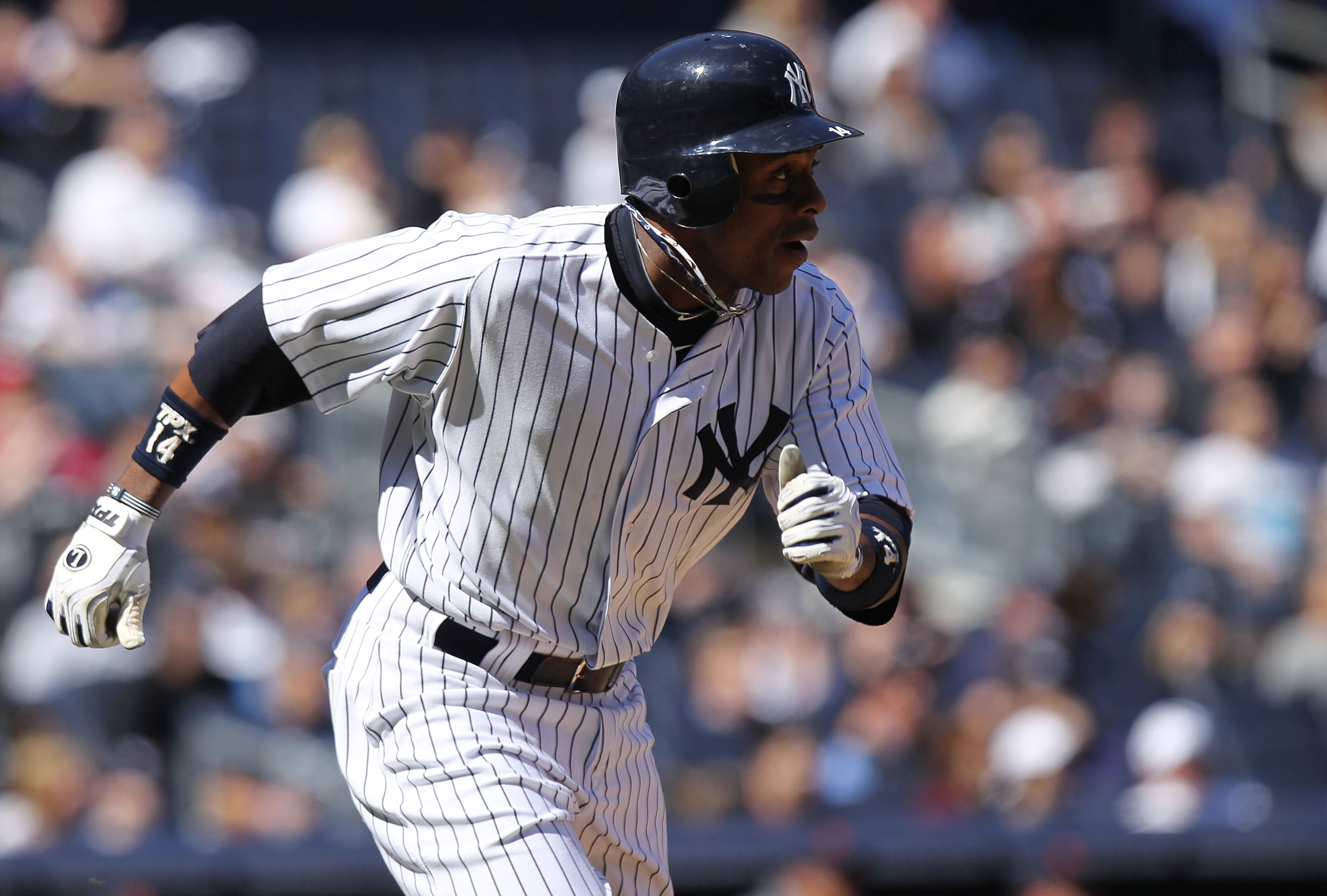 NEW YORK, NY - APRIL 03: Curtis Granderson #14 of the New York Yankees against the Detroit Tigers at Yankee Stadium on April 3, 2011 in the Bronx borough of New York City.  (Photo by Nick Laham/Getty Images)