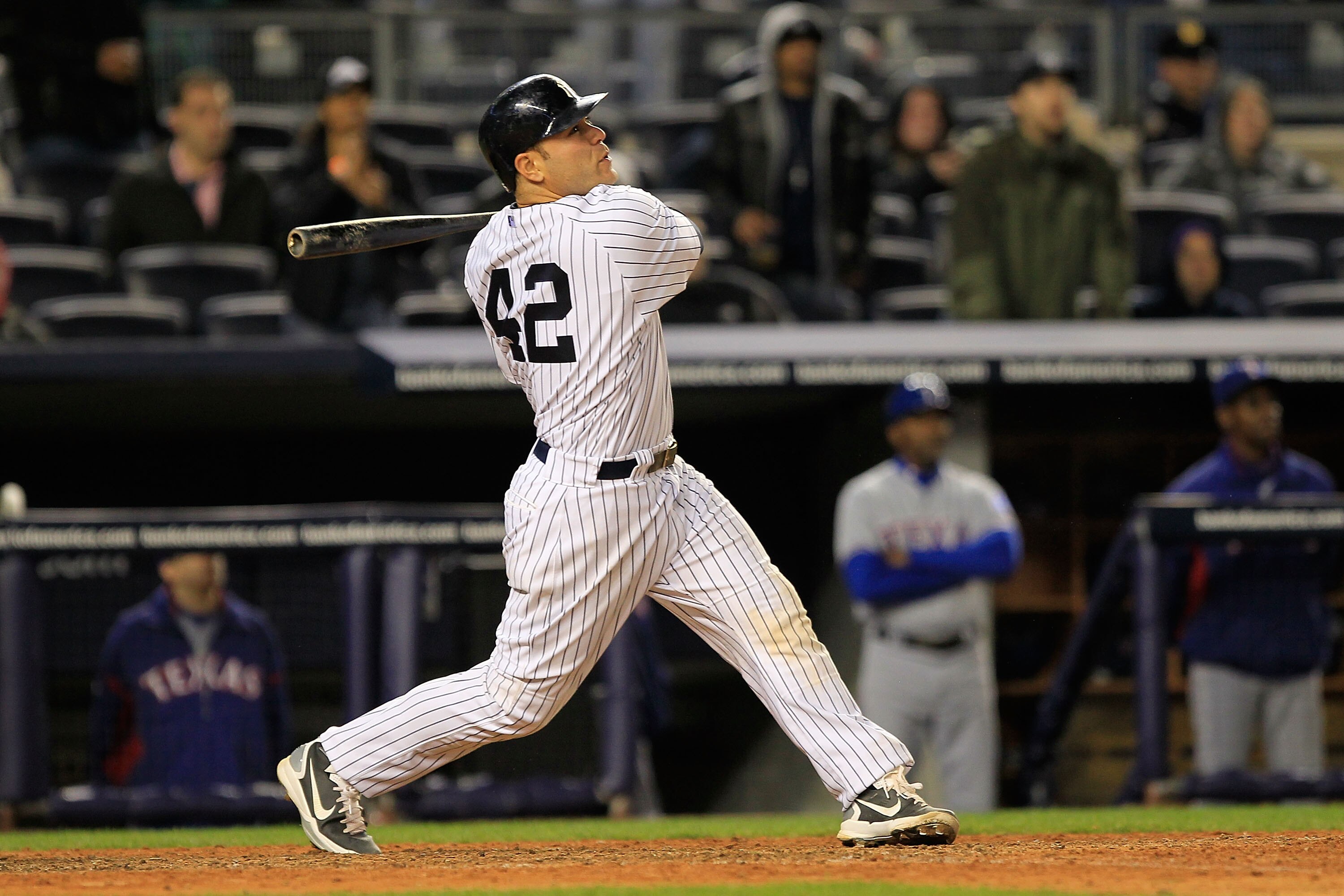 NEW YORK, NY - APRIL 15: Russell Martin of the New York Yankees flies out in the 9th inning for the last at bat against the Texas Rangers at Yankee Stadium on April 15, 2011 in the Bronx borough of New York City. The Rangers defeated the Yankees 5-3. (Pho