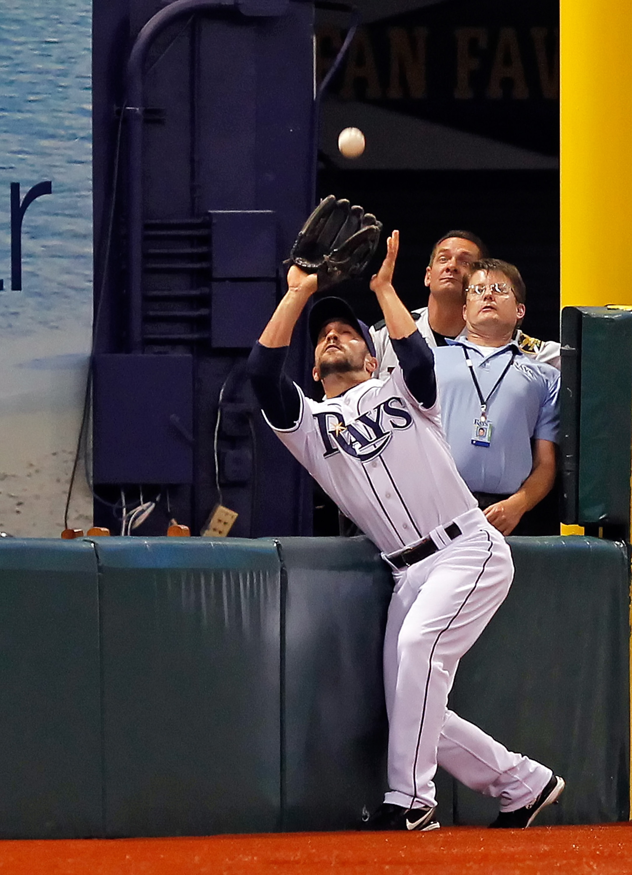 ST. PETERSBURG, FL - APRIL 21:  Outfielder Sam Fuld #5 of the Tampa Bay Rays catches a foul ball against the Chicago White Sox during the game at Tropicana Field on April 21, 2011 in St. Petersburg, Florida.  (Photo by J. Meric/Getty Images)