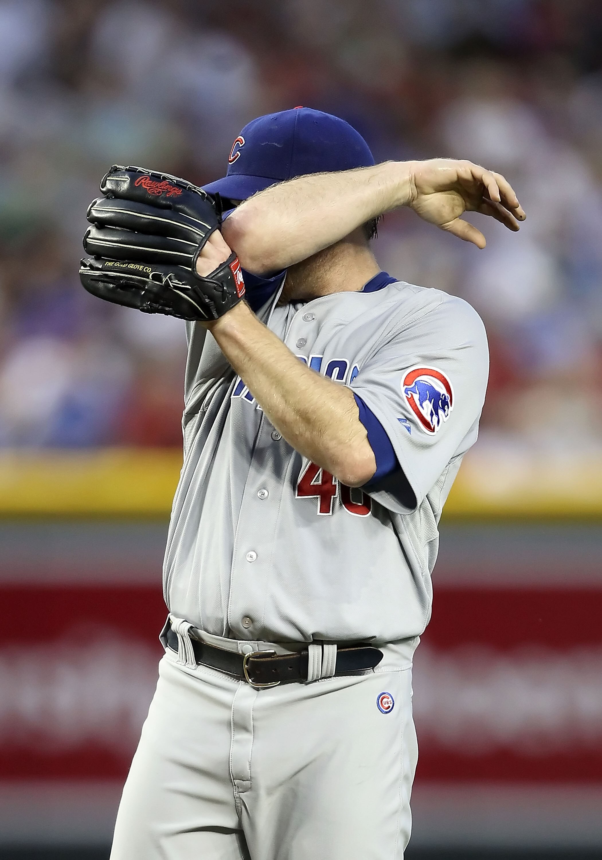 PHOENIX, AZ - APRIL 28: Starting pitcher Ryan Dempster #46 of the Chicago Cubs reacts on the mound during the first inning of the Major League Baseball game at Chase Field on April 28, 2011 in Phoenix, Arizona. (Photo by Christian Petersen/Getty Images) PHOENIX, AZ - APRIL 28: Starting pitcher Ryan Dempster #46 of the Chicago Cubs reacts on the mound during the first inning of the Major League Baseball game at Chase Field on April 28, 2011 in Phoenix, Arizona. (Photo by Christian Petersen/Getty Images)