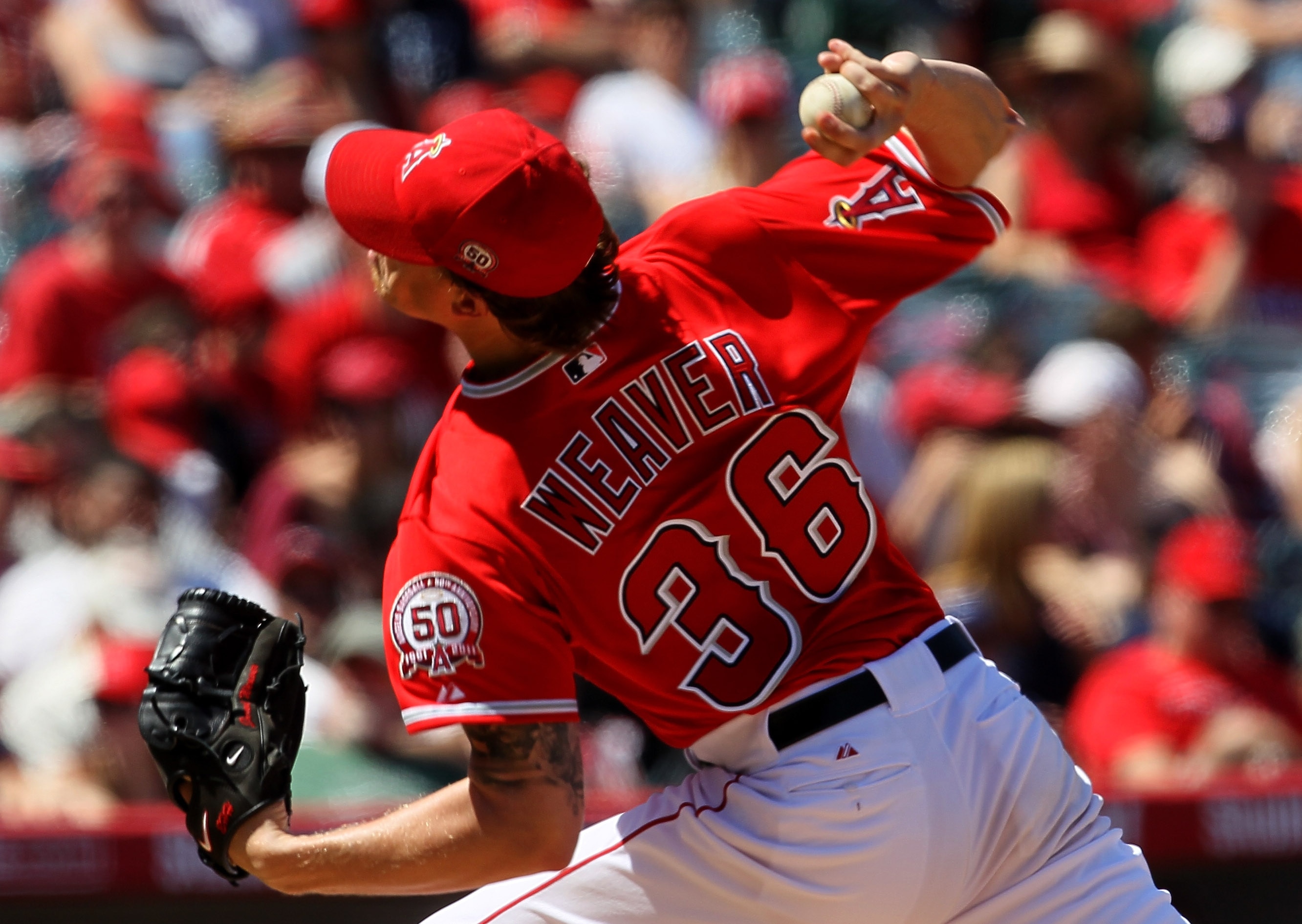 ANAHEIM, CA - APRIL 10: Jered Weaver #36 of the Los Angeles Angels of Anaheim throws a pitch against the Toronto Blue Jays on April 10, 2011 at Angel Stadium in Anaheim, California. The Angels won 3-1. (Photo by Stephen Dunn/Getty Images) ANAHEIM, CA - APRIL 10: Jered Weaver #36 of the Los Angeles Angels of Anaheim throws a pitch against the Toronto Blue Jays on April 10, 2011 at Angel Stadium in Anaheim, California. The Angels won 3-1. (Photo by Stephen Dunn/Getty Images)