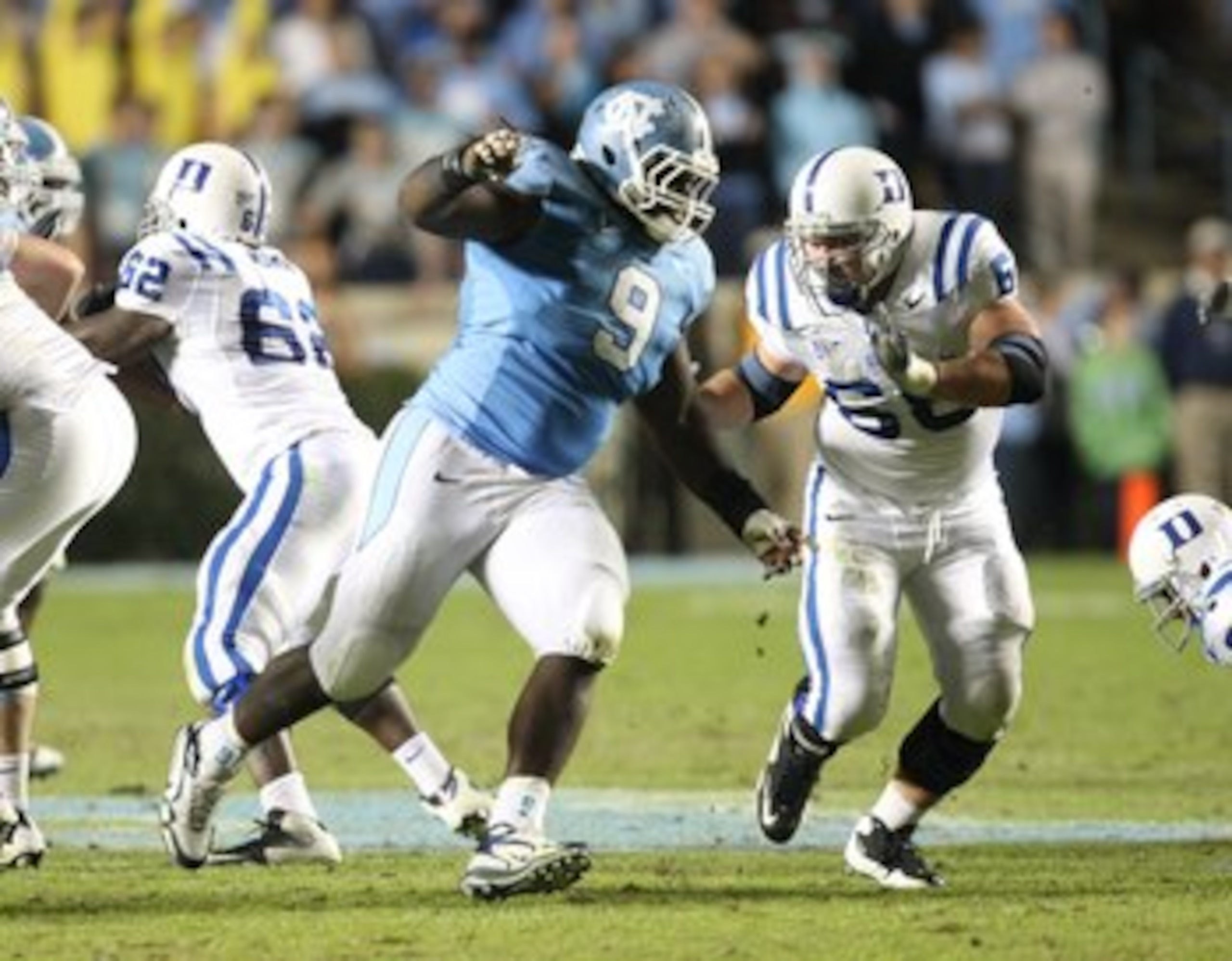 CHAPEL HILL, NC - NOVEMBER 7: Marvin Austin #9 of the North Carolina Tar Heels rushes against Brian Moore #68 of the Duke Blue Devils at Kenan Stadium on November 7, 2009 in Chapel Hill, North Carolina. (Photo by Streeter Lecka/Getty Images) CHAPEL HILL, NC - NOVEMBER 7: Marvin Austin #9 of the North Carolina Tar Heels rushes against Brian Moore #68 of the Duke Blue Devils at Kenan Stadium on November 7, 2009 in Chapel Hill, North Carolina. (Photo by Streeter Lecka/Getty Images)