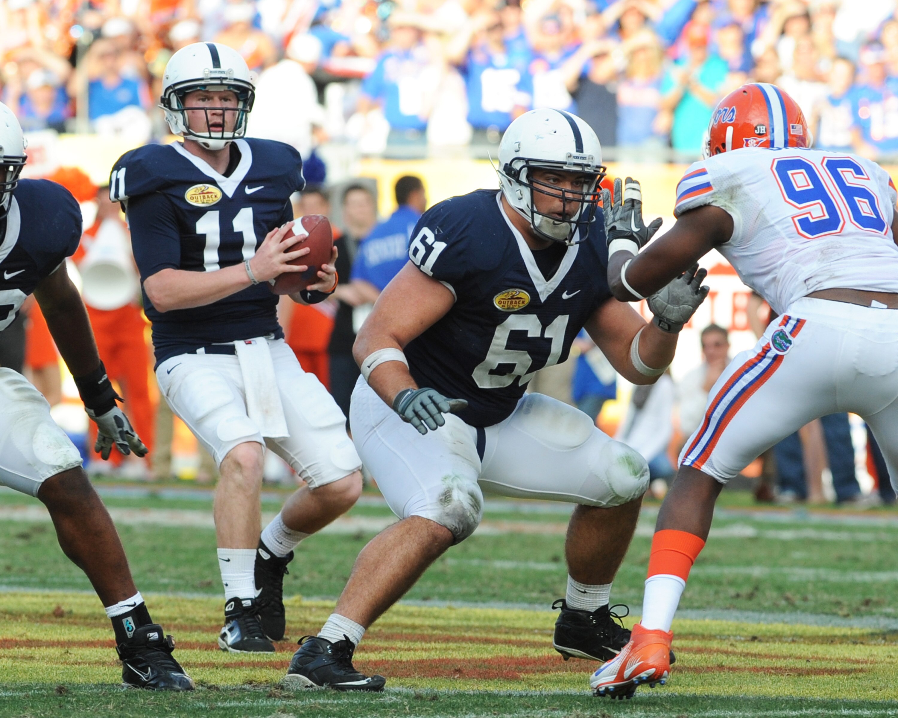 TAMPA, FL - JANUARY 1:  Guard Stefan Wisniewski #61 of the Penn State Nittany Lions blocks against the Florida Gators January 1, 2010 in the 25th Outback Bowl at Raymond James Stadium in Tampa, Florida.  (Photo by Al Messerschmidt/Getty Images)