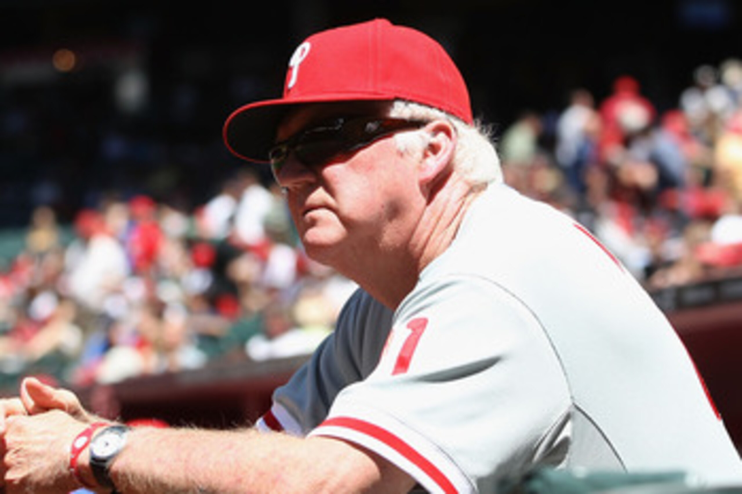 PHOENIX, AZ - APRIL 27:  Manager Charlie Manuel of the Philadelphia Phillies watches from the dugout during the Major League Baseball game against the Arizona Diamondbacks at Chase Field on April 27, 2011 in Phoenix, Arizona.  The Phillies defeated the Di