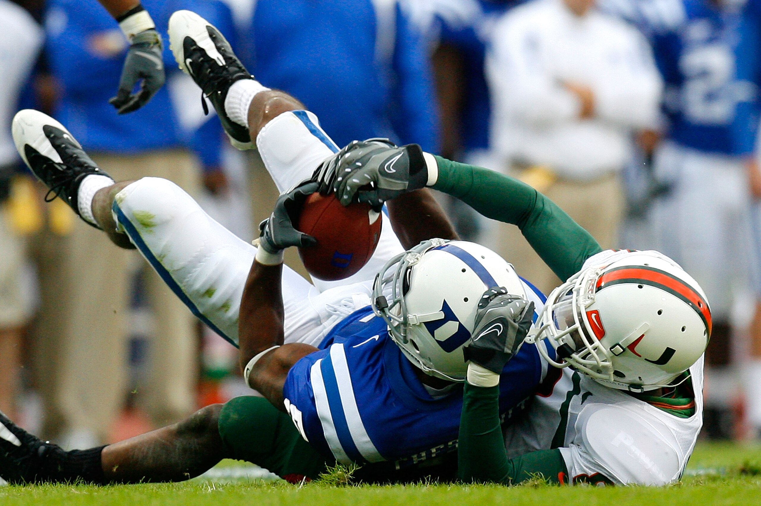 DURHAM, NC - OCTOBER 18:  Receiver Raphael Chestnut #5 of the Duke Blue Devils pulls in this reception against DeMarcus Van Dyke #8 of the Miami Hurricanes during the game at Wallace Wade Stadium on October 18, 2008 in Durham, North Carolina.  (Photo by K