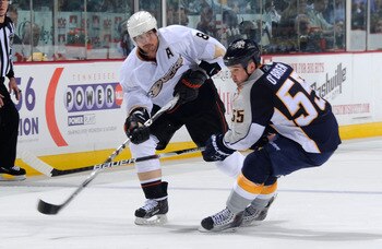 NASHVILLE, TN - APRIL 20:  Teemu Selanne #8 of the Anaheim Ducks skates against Shane O'Brien #55 of the Nashville Predators in Game Four of the Western Conference Quarterfinals during the 2011 NHL Stanley Cup Playoffs at Bridgestone Arena on April 20, 20