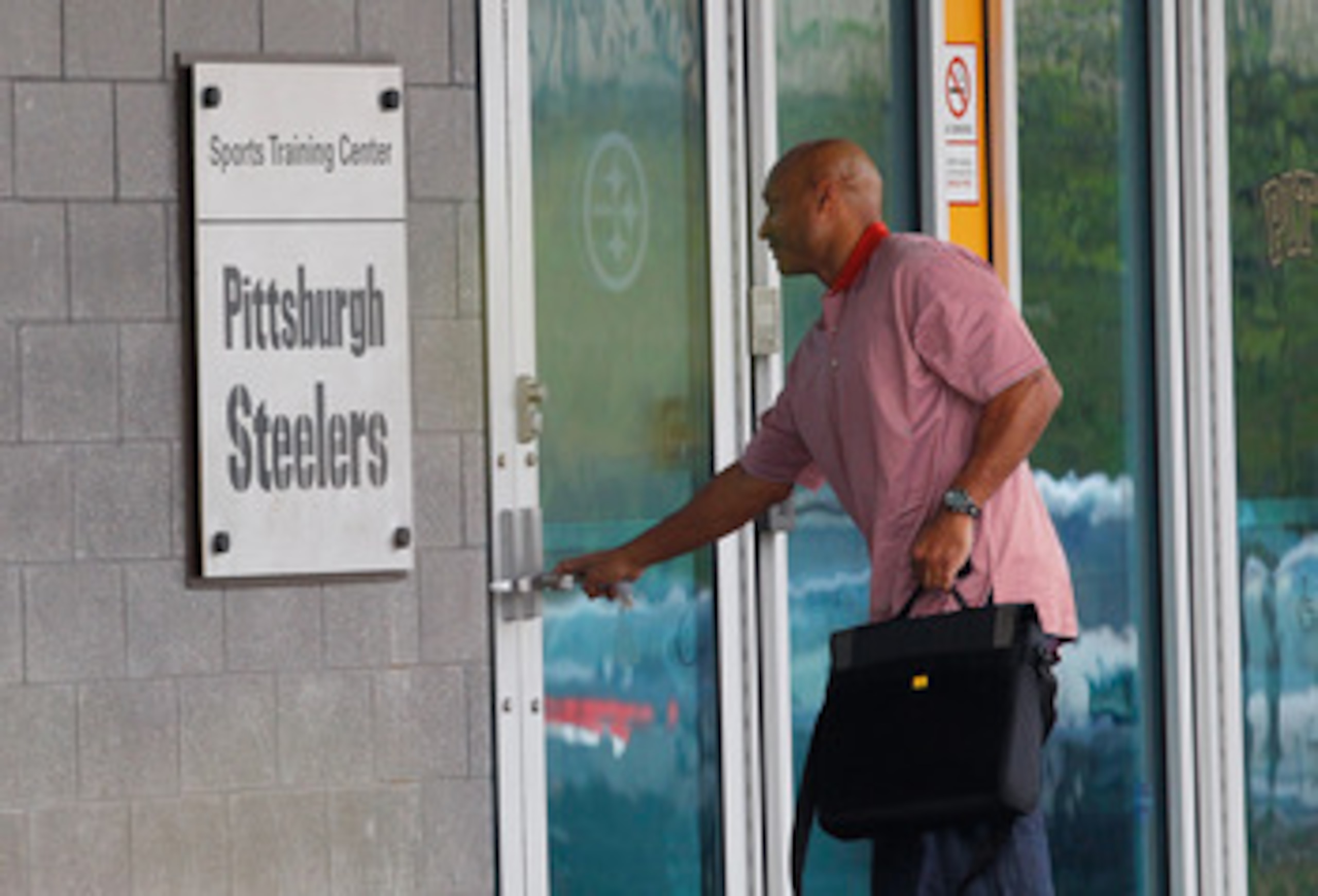 PITTSBURGH - APRIL 26:  A day after the NFL lockout was lifted, new defensive backs coach, Carnell Lake of the Pittsburgh Steelers reports to the South Side training facility on April 26, 2011 in Pittsburgh, Pennsylvania.  (Photo by Jared Wickerham/Getty