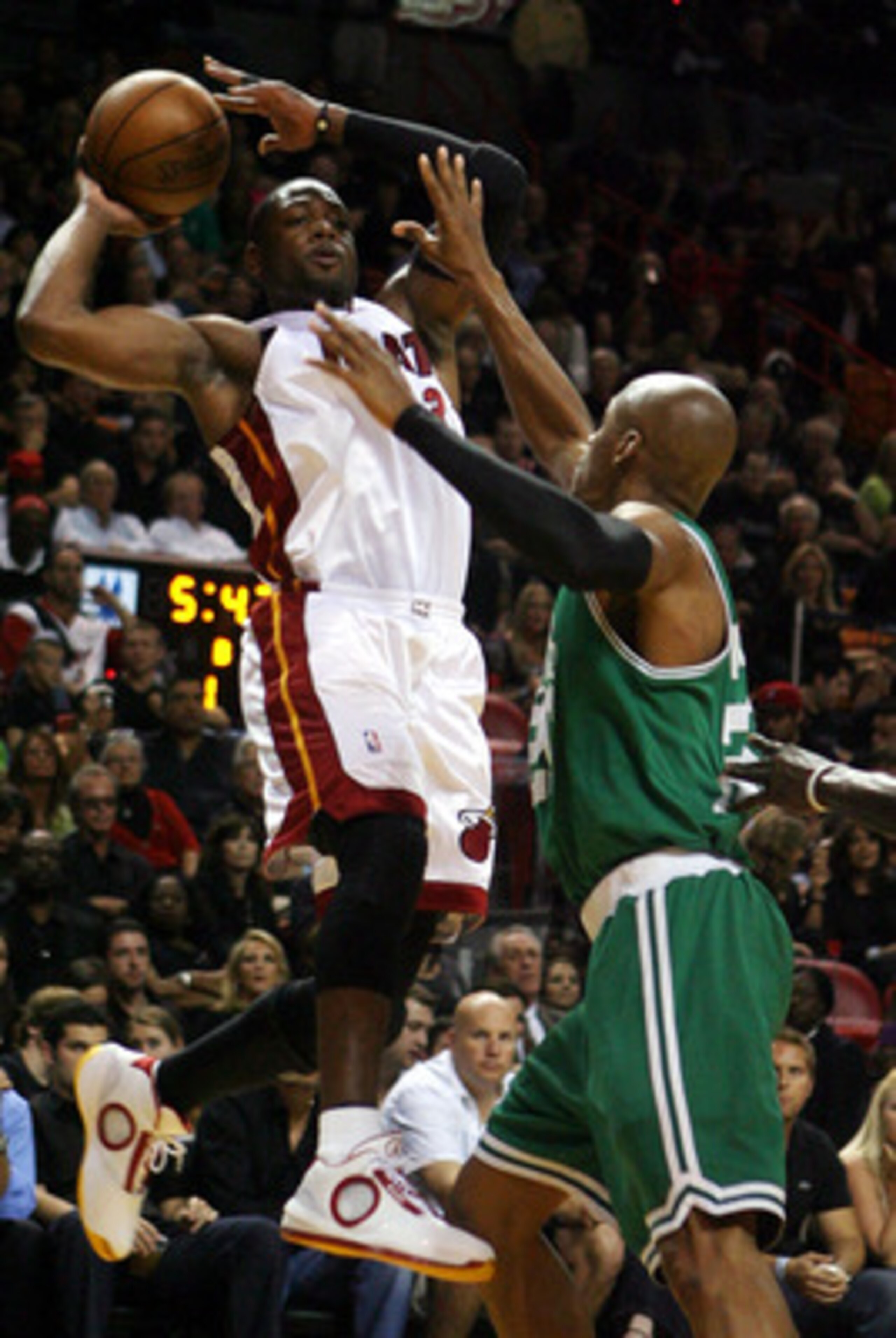 MIAMI - APRIL 23:  Guard Ray Allen #20 of the Boston Celtics defends guard Dwyane Wade #3 of the Miami Heat in Game Three of the Eastern Conference Quarterfinals during the 2010 NBA Playoffs at American Airlines Arena on April 23, 2010 in Miami, Florida. 