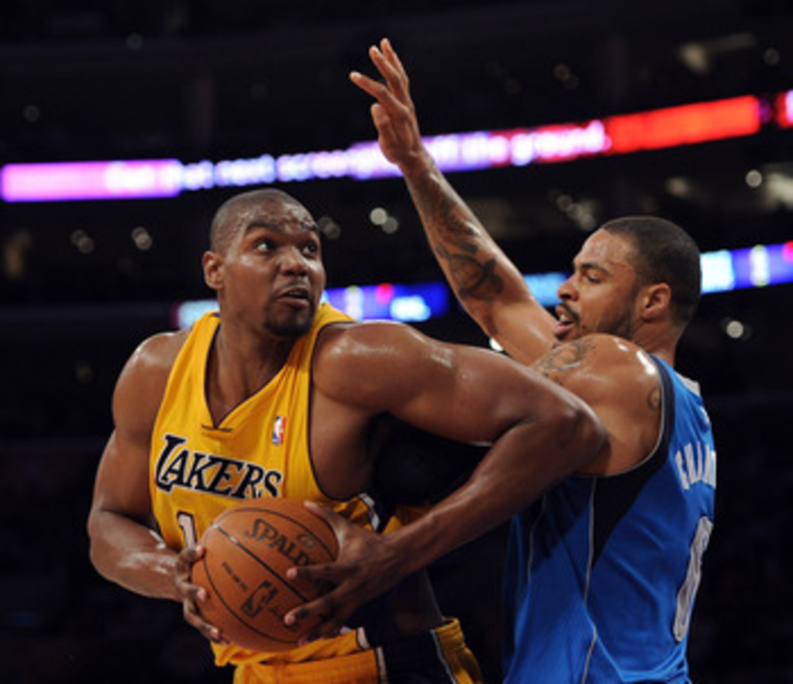 LOS ANGELES, CA - MARCH 31: Andrew Bynum #17 of the Los Angeles Lakers turns from the defense of Tyson Chandler #6 of the Dallas Mavericks at Staples Center on March 31, 2011 in Los Angeles, California. NOTE TO USER: User expressly acknowledges and agre LOS ANGELES, CA - MARCH 31: Andrew Bynum #17 of the Los Angeles Lakers turns from the defense of Tyson Chandler #6 of the Dallas Mavericks at Staples Center on March 31, 2011 in Los Angeles, California. NOTE TO USER: User expressly acknowledges and agre